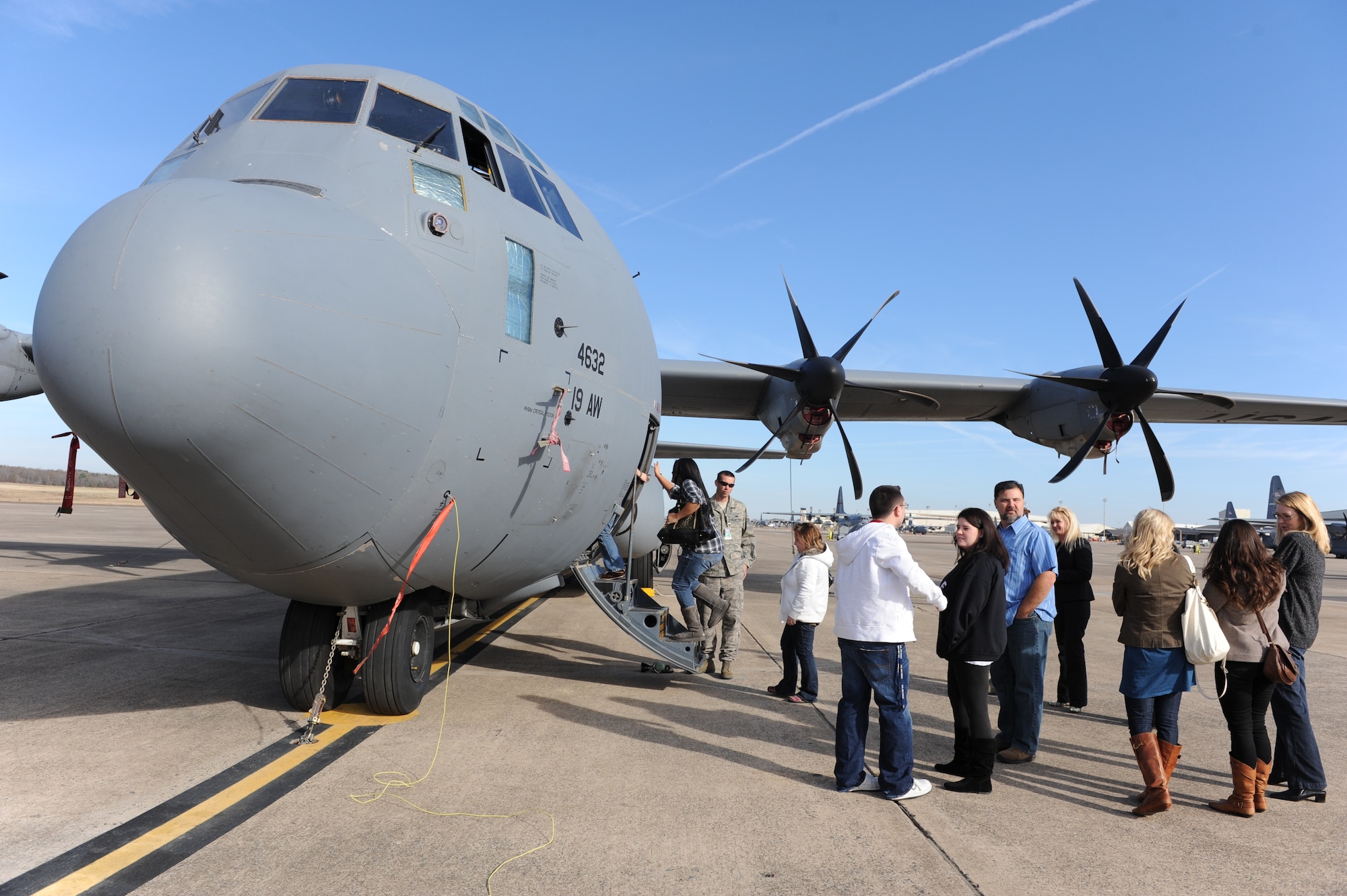 Team Little Rock spouses tour a C-130 Dec. 3, 2010, on the flightline at Little Rock Air Force Base, Ark. The spouses were part of the Airman and Family Readiness Center’s Heart Link immersion, which is a program to educate Air Force spouses about the service, and explains the culture, customs and courtesies among other topics. (U.S. Air Force photo by Airman 1st Class Ellora Stewart)