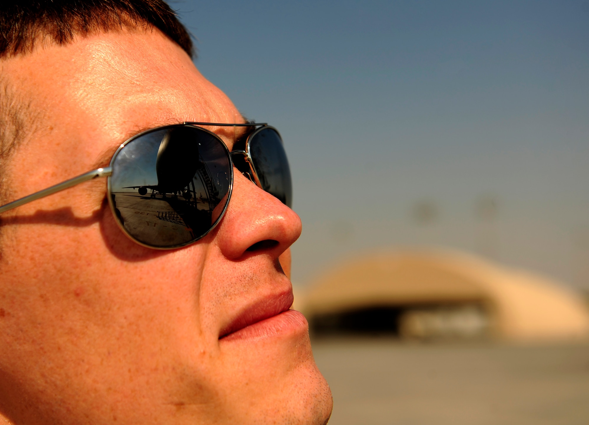 Capt. Wes Spurlock, a KC-10 Extender pilot with the 908th Expeditionary Air Refueling Squadron, performs preflight checks on a plane at an undisclosed base in Southwest Asia on Nov. 25, 2010. Captain Spurlock is deployed from 9th Air Refueling Wing, 60th Air Mobility Wing, at Travis Air Force Base, Calif. (U.S. Air Force Photo/Staff Sgt. Andy M. Kin)