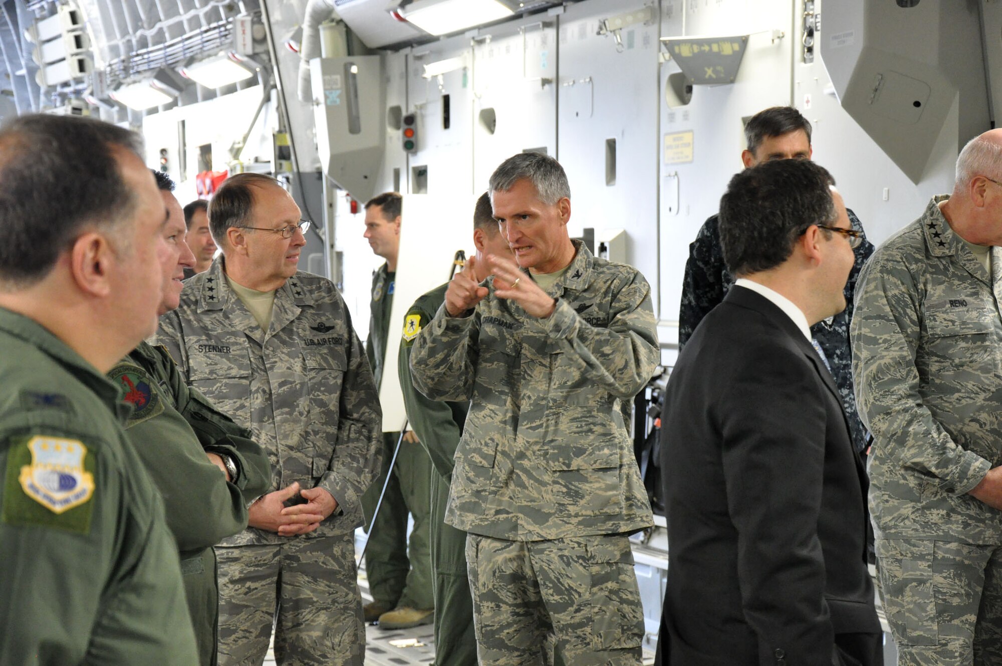 Col. Steven Chapman, 315th Airlift Wing Commander, shares information about the reserve and active duty relationship regarding airlift and aeromedical evacuation operations with Lt. Gen. Charles Stenner, Chief of Air Force Reserve, during an official visit to Joint Base Charleston, S.C. Dec. 4, 2010. (U.S. Air Force photo/Senior Airman Robert Pilch) 
