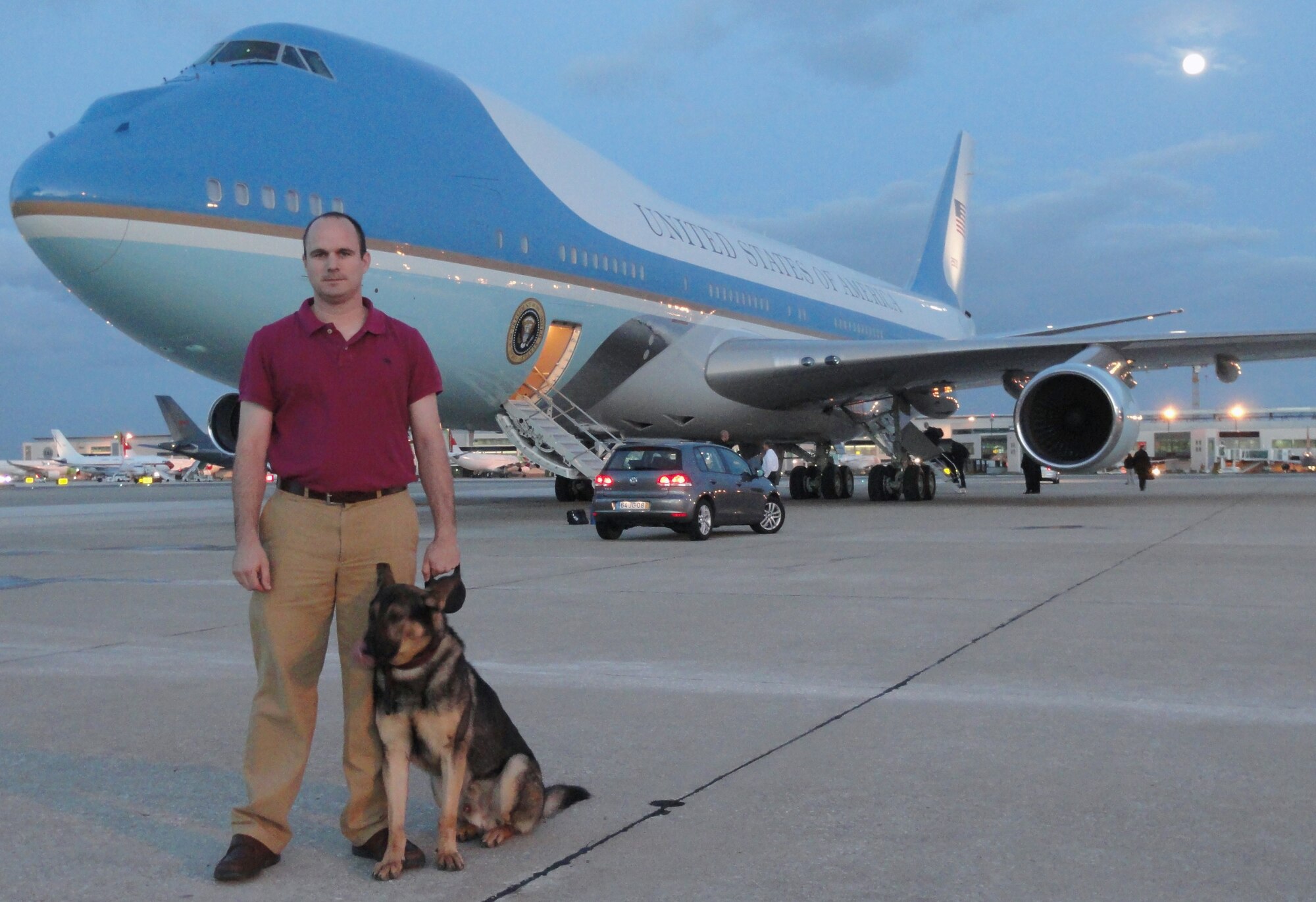 Staff Sgt. Curtis Locke and his K-9, Devil, deployed to Lisbon, Portugal, Nov. 15, 2010, through 22, 2010, to help provide the presidential jet with a specialized detection capability for Air Force One at the G40 summit. Sergeant Locke is assigned to the 65th Security Forces Squadron. (Courtesy photo)