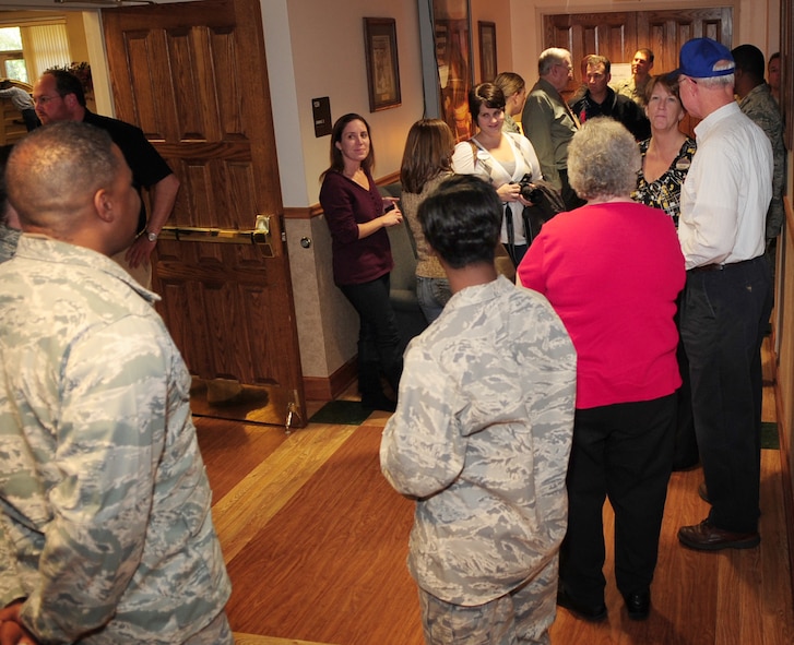 MOODY AIR FORCE BASE, Ga. -- Members from the 23rd Wing wait for the opening of the Officer’s Lounge Dec. 3. The Officer's Lounge was closed for two months for various renovations. (U.S. Air Force photo/Senior Airman Stephanie Mancha)(RELEASED)