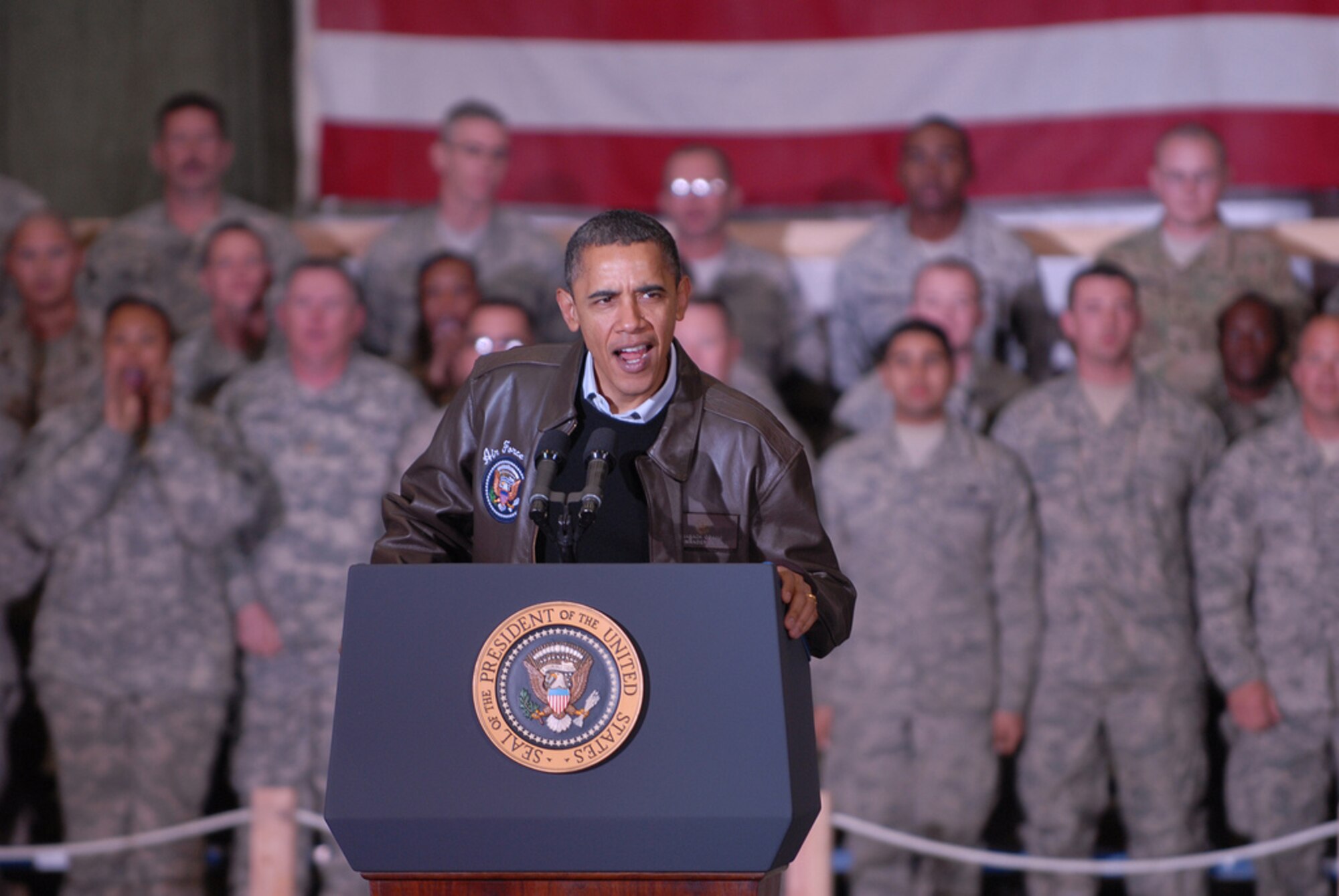 President Barack Obama addresses troops at Bagram Airfield, Afghanistan, Dec. 3, 2010, during a surprise visit. The president also visited the Bagram hospital and awarded five Purple Heart medals to wounded servicemembers there.  (Department of Defense photo/Michael Sparks)