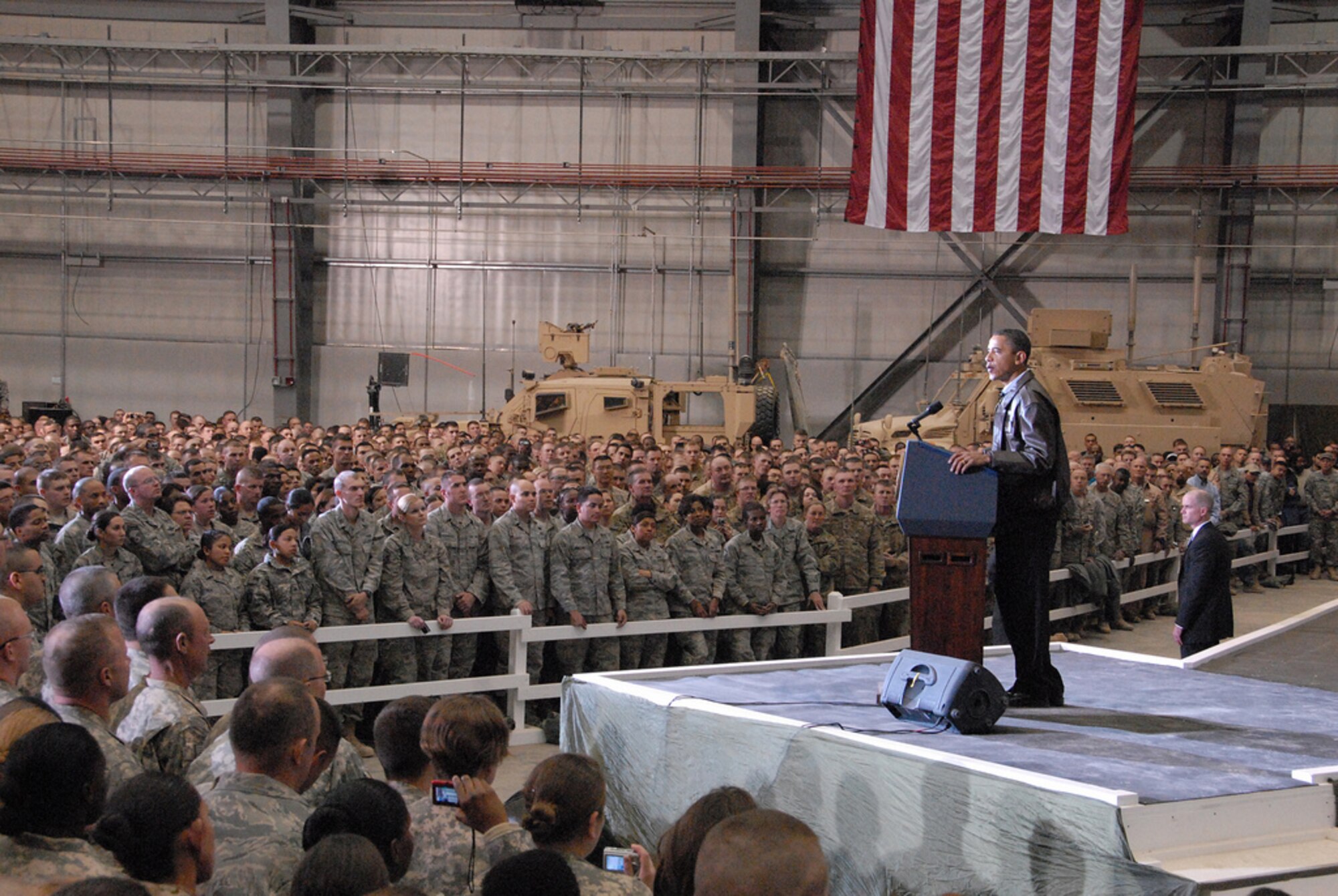 President Barack Obama addresses troops at Bagram Airfield, Afghanistan, Dec. 3, 2010, during a surprise visit. The president also visited the Bagram hospital and awarded five Purple Heart medals to wounded servicemembers there.  (Department of Defense photo)