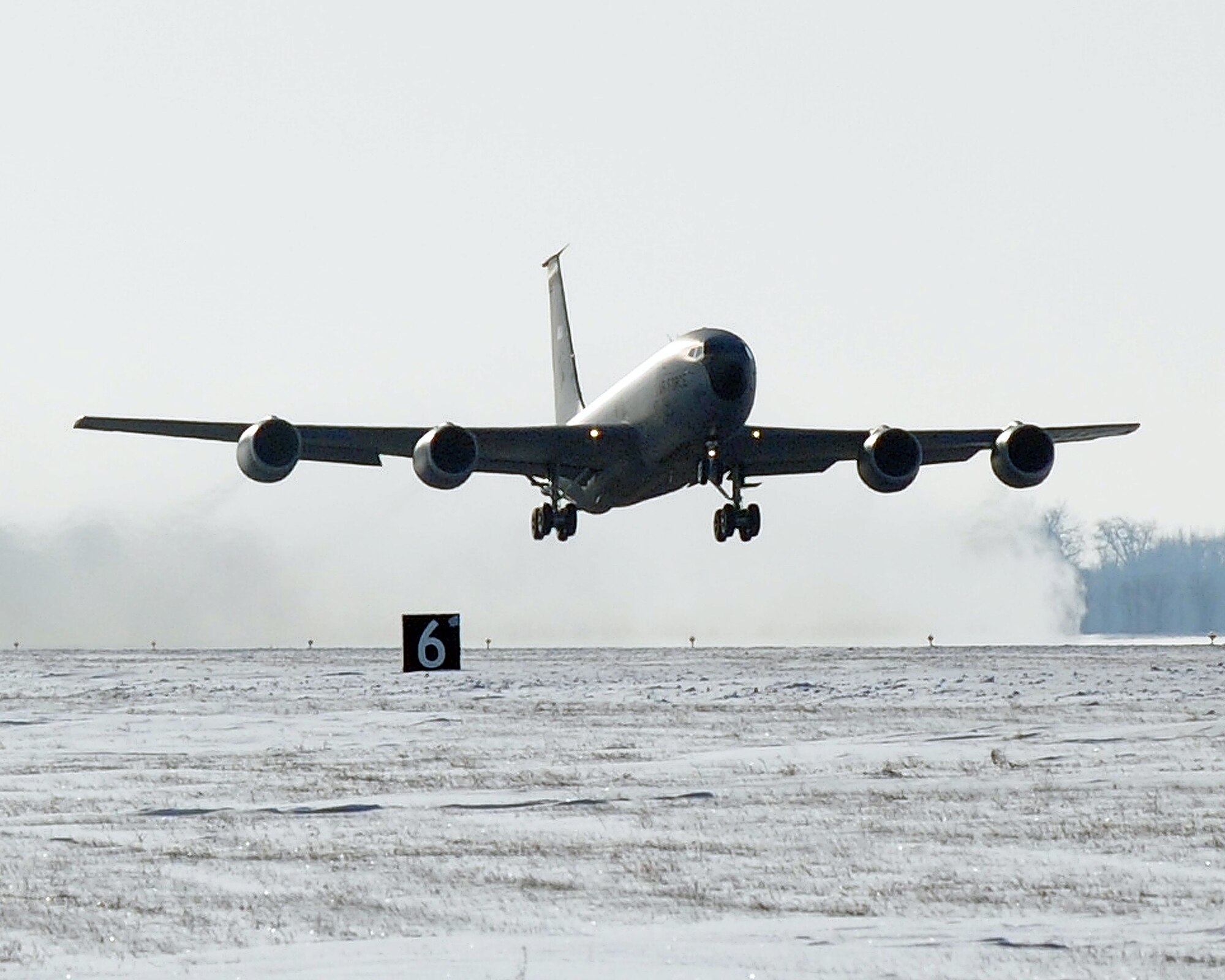 The final KC-135 Stratotanker takes-off from Grand Forks Air Force Base Dec. 4. The departure of this aircraft signaled the end to the rich history of the KC-135 air refueling mission. (U.S. Air Force photo by Tech. Sgt. Johnny Saldivar) 