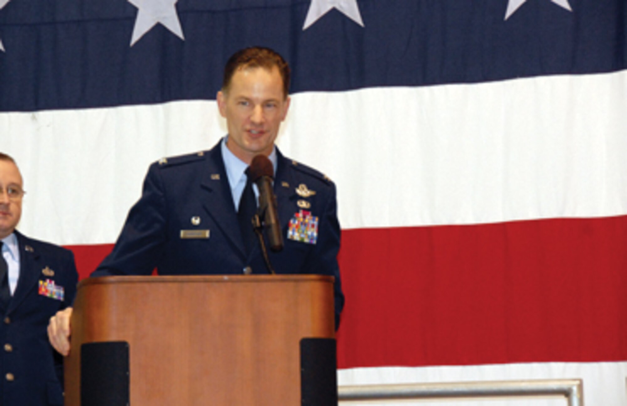 Col. Eric S. Overturf gives a speech after receiving command of the 442nd Fighter Wing in a ceremony Dec. 4, 2010. Colonel Overturf took the reigns of the command from Col. Mark Clemons. The ceremony's officiating officer was Maj. Gen. Frank Padilla. The 442nd Fighter Wing is an A-10 Thundebrolt II Air Force Reserve unit at Whiteman Air Force Base, Mo. (U.S. Air Force photo/Staff Sgt. Kent Kagarise)