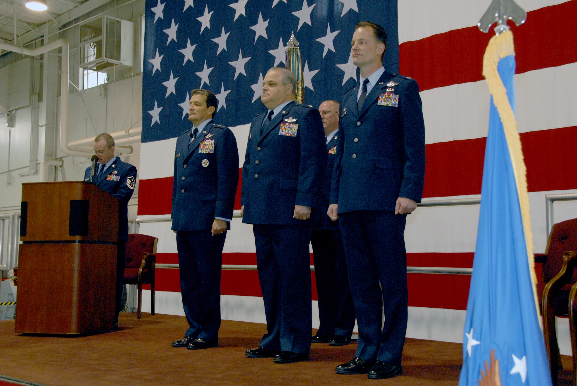 First Sgt. (Master Sgt.) Leo Brown, 303rd Fighter Squadron, narrates the 442nd Fighter Wing change-of-command ceremony. During the ceremony, Maj. Gen. Frank Padilla, 10th Air Force commander, acted as the officiating officer as Col. Mark Clemons relinquished command of the wing to Col. Eric Overturf Dec. 4, 2010. The 442nd Fighter Wing is an A-10 Thunderbolt II Air Force Reserve unit at Whiteman Air Force Base, Mo. (U.S. Air Force photo/Staff Sgt. Kent Kagarise)
