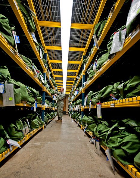 Staff Sgt. David Forston, 96th Logistics Readiness Squadron, checks the contents of the Air Force's "C" bag, which contains chemical gear issued to Airmen prior to deploying.  The material management flight maintains more than 700 C bags ready for issue.  (U.S. Air Force photo/ Samuel King Jr.)
