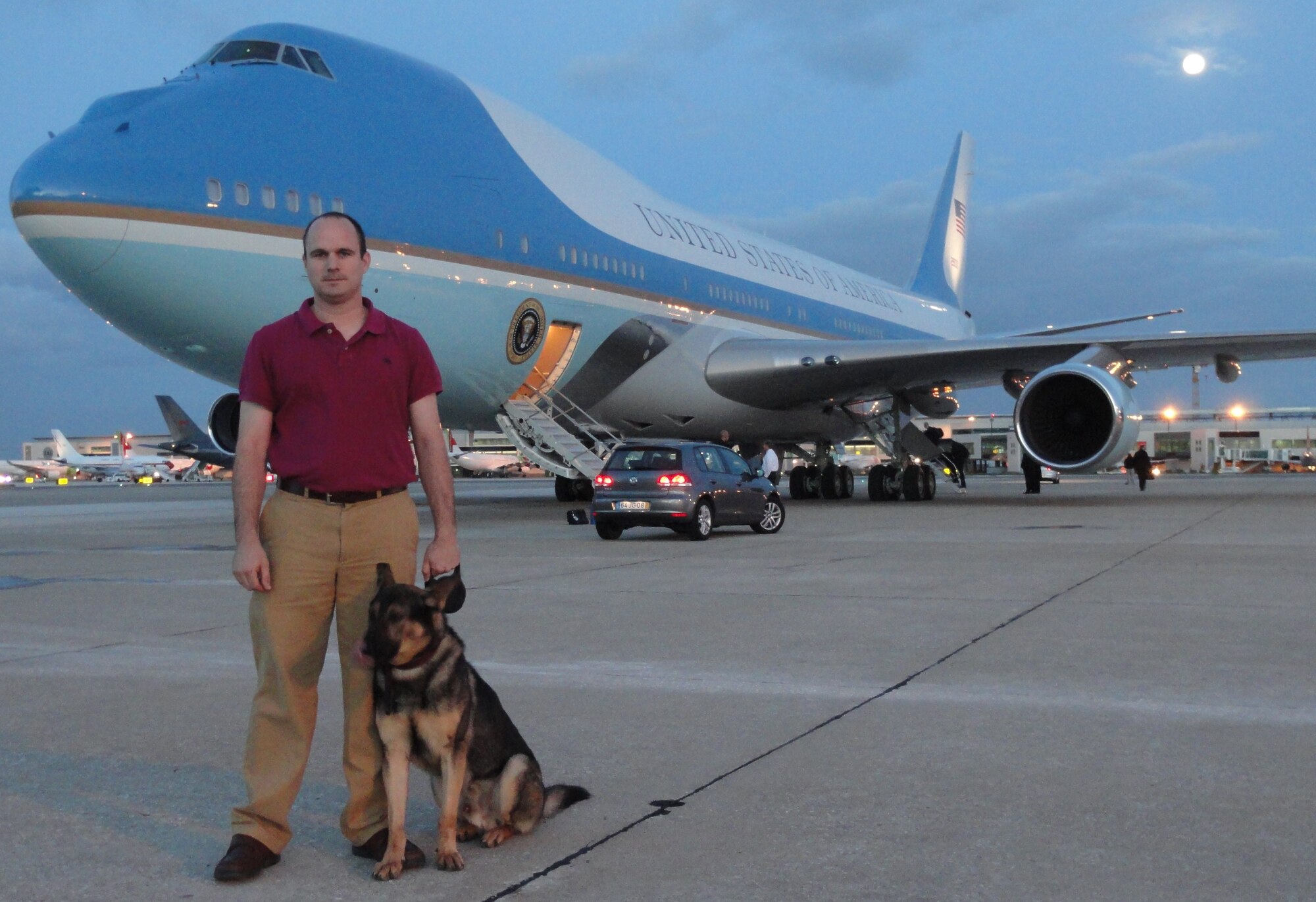 Staff Sgt. Curtis Locke, 65th Security Forces Squadron, and his K-9, named Devil, deploy from Lajes Field to Lisbon, Portugal, Nov. 15-22 to help provide the presidential jet with  a specialized detection capability. Sergeant Locke and his K-9 was part of the security detail that provided support for Air Force One at the NATO summit in Lisbon Nov. 19-20. (Courtesy photo)