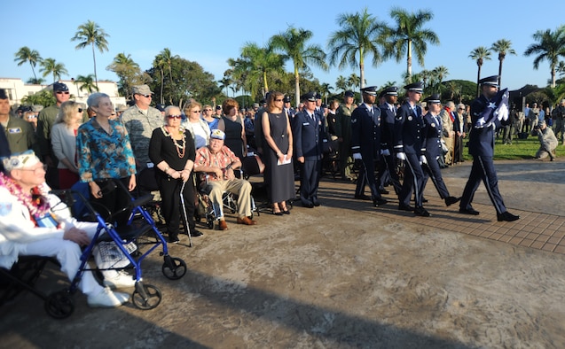 Members of the Hickam Honor Guard march forward to raise the Colors during a remembrance ceremony at Atterbury Circle, Joint Base Pearl Harbor-Hickam Dec. 7, 2010. This year marks the 69th anniversary of the Dec. 7, 1941 attacks on Oahu by the Japanese Empire, which in turn, launched the United States into World War II. (U.S. Air Force Photo/Airman 1st Class Lauren Main)