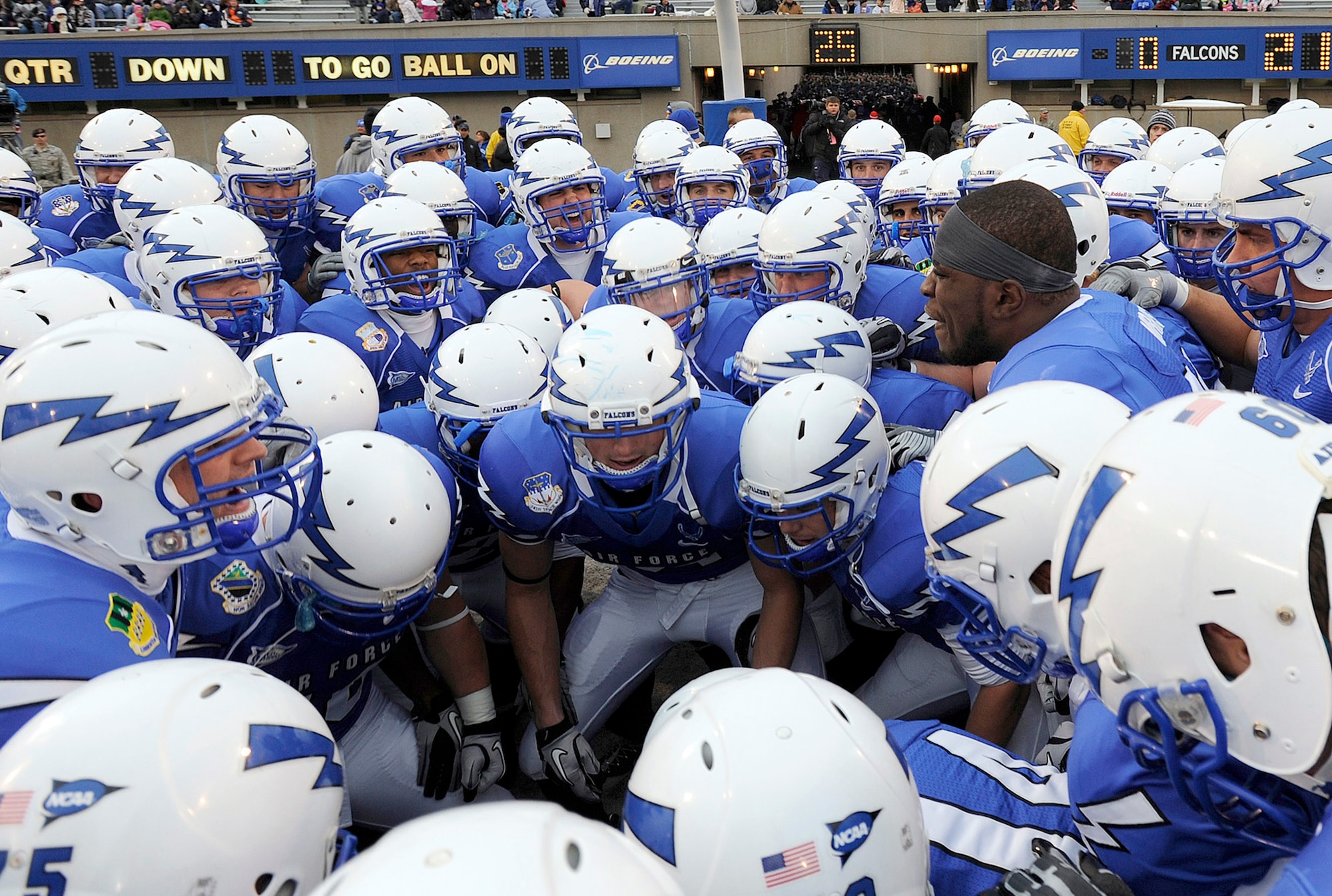 Senior defensive back Reggie Rembert leads the Air Force Falcons in a huddle before the start of the last home game of the season against New Mexico Nov. 13, 2010, at Falcon Stadium in Colorado Springs, Colo. The Falcons will play Georgia Tech in the 2010 AdvoCare V100 Independence Bowl Dec. 27. (U.S. Air Force photo/Mike Kaplan)