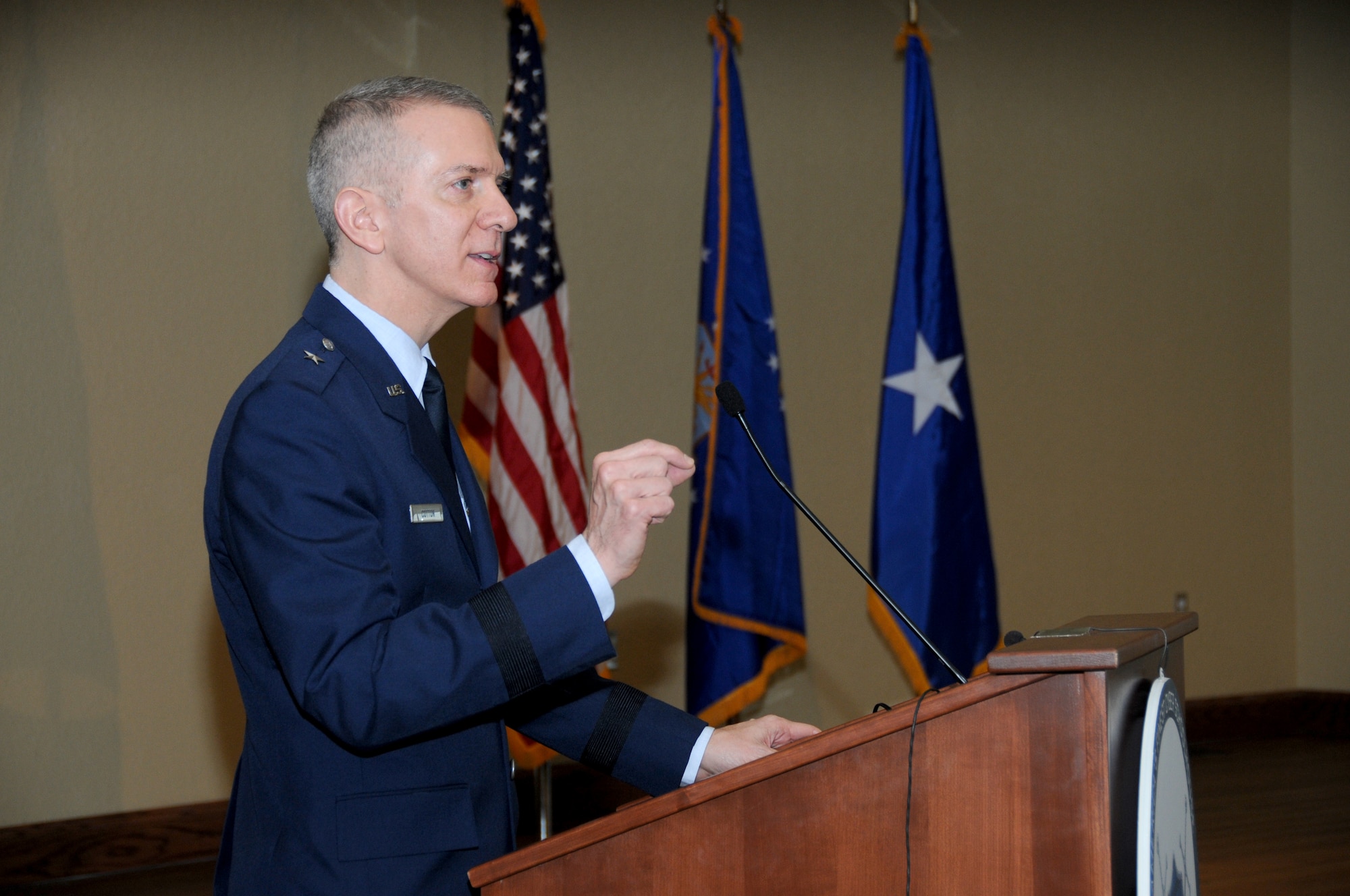 Brig. Gen. David Cotton speaks at the first undergraduate cyberspace training course graduation ceremony today at Keesler Air Force Base, Miss.  He's director of cyberspace operation and Air Force senior information assurance officer for the Secretary of the Air Force Office of Information Dominance at the Pentagon.  (U.S. Air Force photo by Kemberly Groue)

