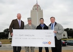 Randolph AFB, TX,2010/12/07:  A check for $21,255 is presented to Air Force representatives by John Barrow, Energy Solutions Manager CPS Energy. The check is a demand response energy credit for energy savings at the base. In the photo, from left, are Barrow, Colonel Scott Peel, 902nd Mission Support Group commander, Ruben D. Ramos Jr., Utilities Engineer 902nd Civil Engineers, and Jim Wimberley, Chief Asset Optimization, 902nd Civil Engineers. 
(U.S. Air Force photo/Dave Terry)