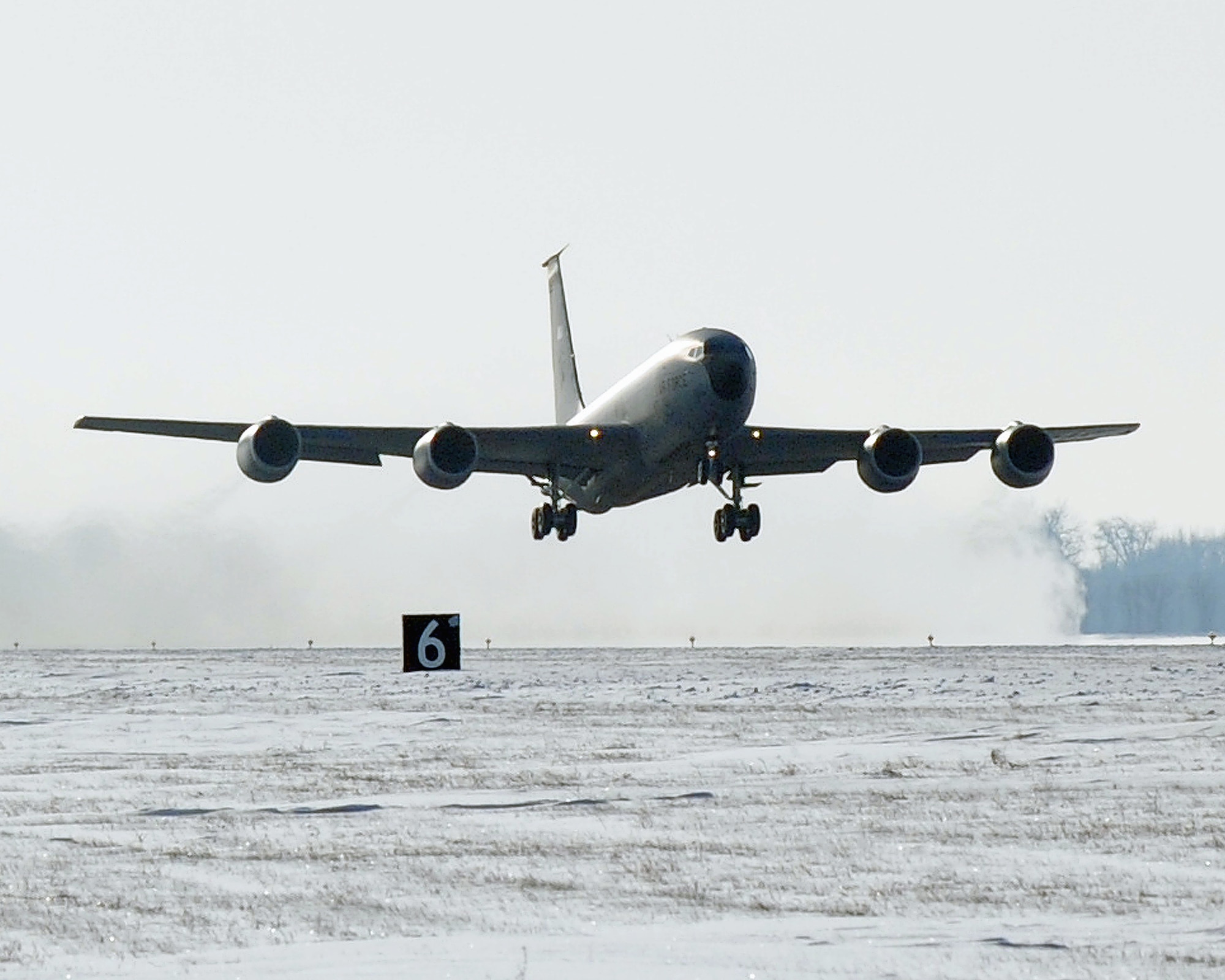 The final KC-135 Stratotanker takes off Dec. 4, 2010, from Grand Forks Air Force Base, N.D. The departure of this aircraft signaled the end of the KC-135 air refueling mission at Grand Forks AFB. The plane was relocated to McConnell AFB, Kan. (U.S. Air Force photo/Tech. Sgt. Johnny Saldivar)