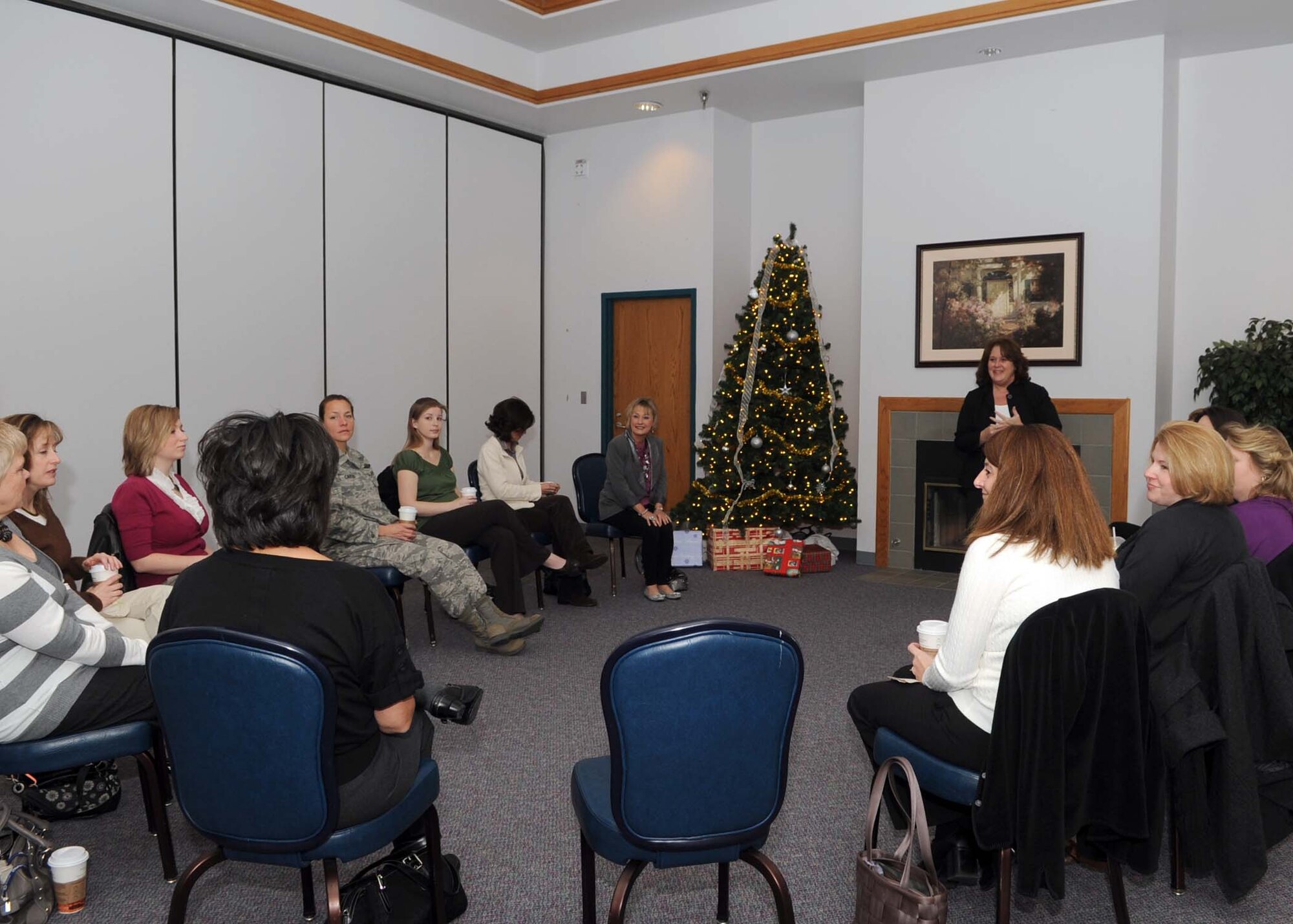 ALTUS AIR FORCE BASE, Okla.- Mrs. Patty Solo, wife of 19th Air Force Commander Major General Mark Solo, meets for coffee and a round-table discussion with enlisted spouses to discuss their concerns about different areas on base Dec. 3. Mrs. Solo toured base agencies supporting Airmen and their families, such as housing, the Child Development Center, the Youth Center and the Wings of Freedom Park. (U.S. Air Force photo/Senior Airman Leandra D. Stepp/Released 97th Air Mobility Wing Public Affairs)