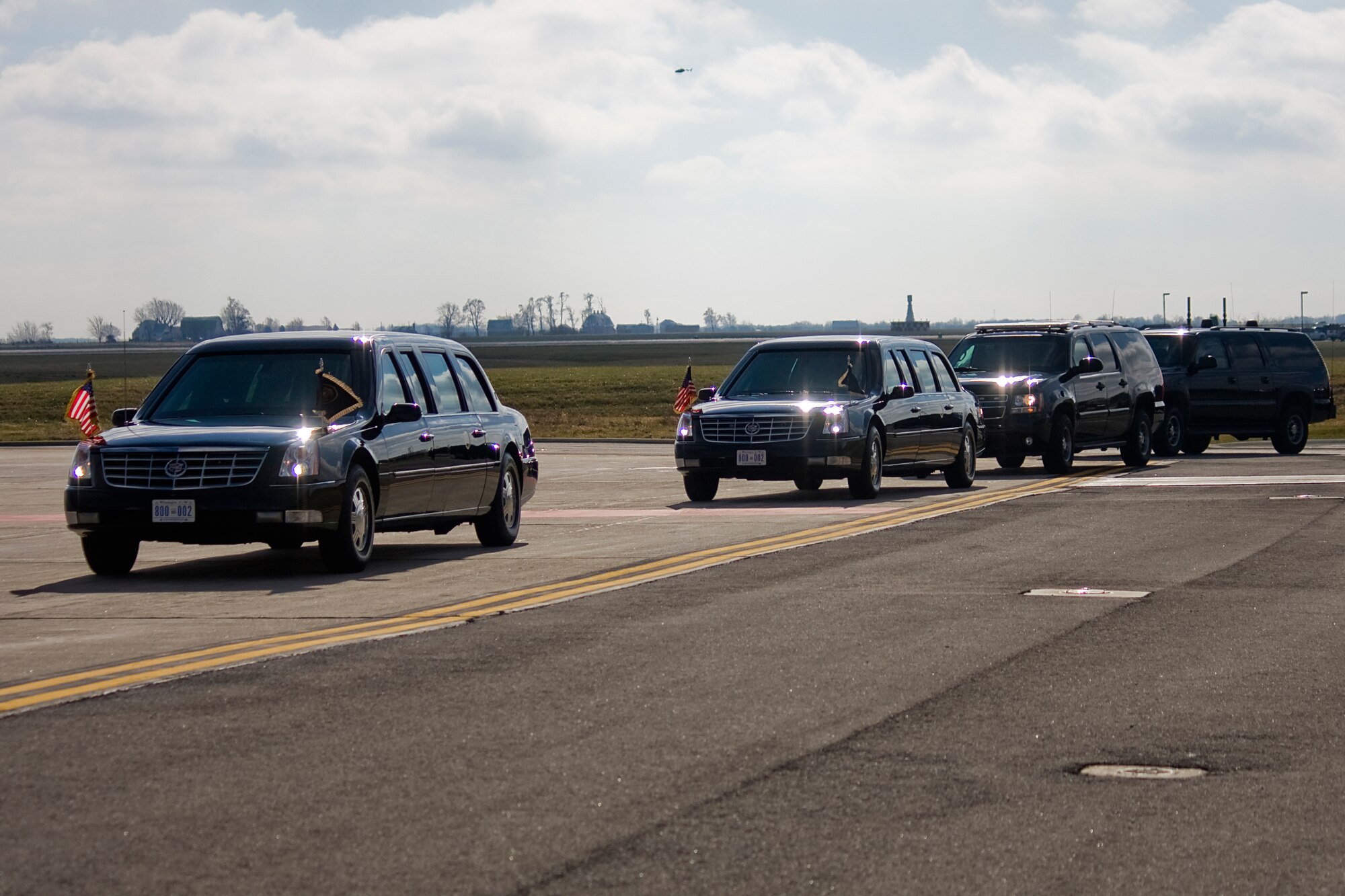GRISSOM AIR RESERVE BASE, Ind. -- The presidential motorcade heads towards Air Force One, where it will pick up President Barack Obama and head to nearby Kokomo, Ind., as part of the president?s White House to Main Street tour. (U.S. Air Force photo/Tech. Sgt. Mark R. W. Orders-Woempner)