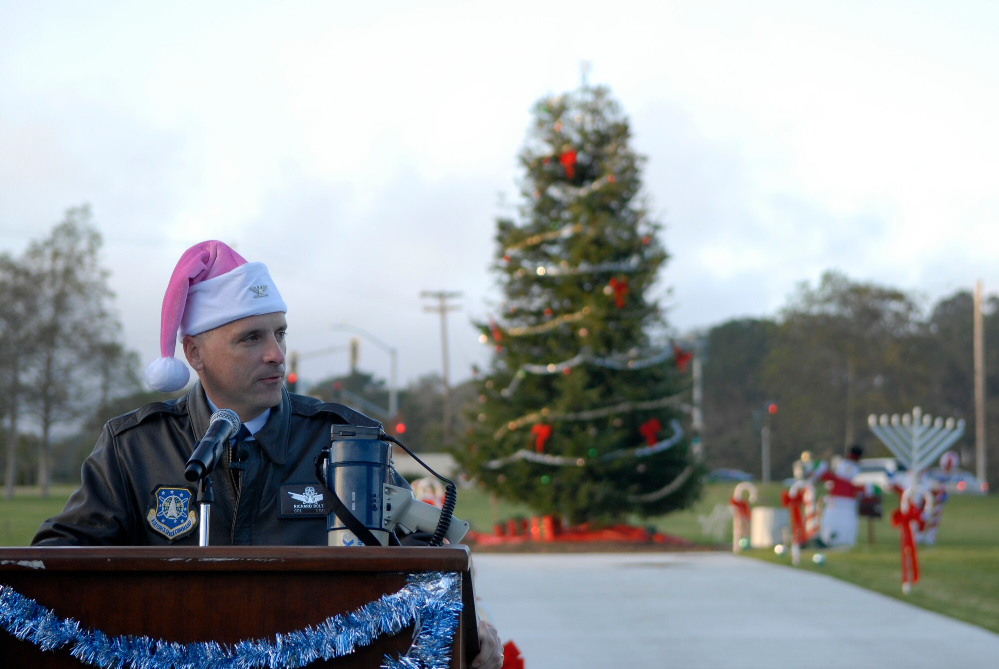 VANDENBERG AIR FORCE BASE, Calif. -- Col. Richard Boltz, 30th Space Wing commander, spoke to the Vandenberg community during the annual holiday tree lighting ceremony here Monday, Dec. 6, 2010.  Wing leadership attended the event along with a special guest, Santa Claus.  (U.S. Air Force photo/Senior Airman Andrew Satran) 
  