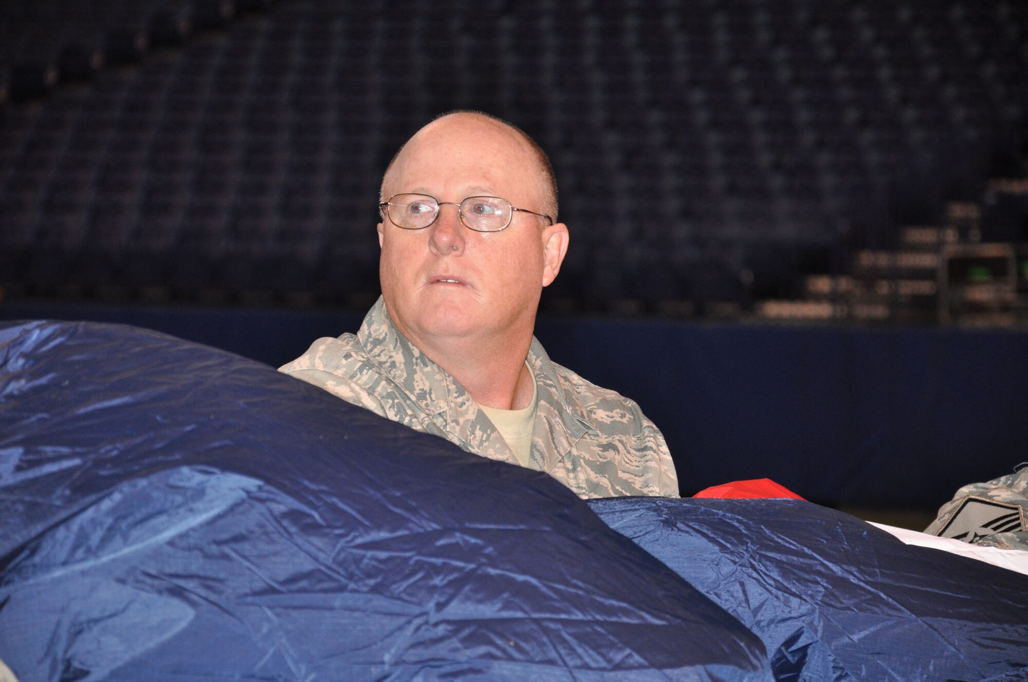 WRIGHT-PATTERSON AIR FORCE BASE, Ohio –Chief Master Sgt. Bill Millar, 445th Aerospace Medicine Squadron, practices holding the large flag with other military men and women from various units, including the 445th Airlift Wing, that will be used during the pre-game activities for the Cincinnati Bengals vs Indianapolis Colts football game Nov. 14. The Wright-Patterson Air Force Base Honor Guard also performed during the pre-game activities (U.S. Air Force photo/Capt. Rod McNany)