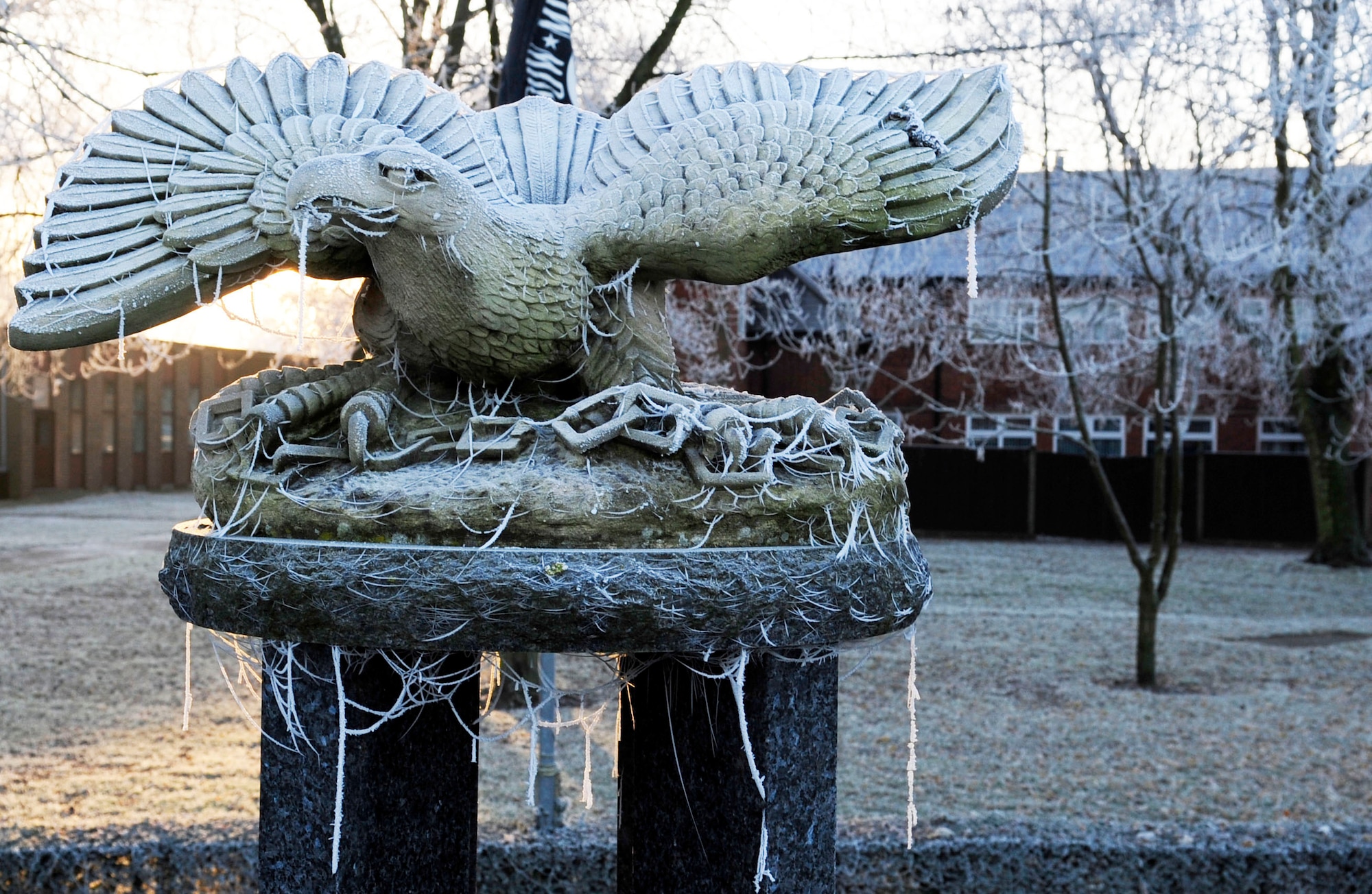 RAF MILDENHALL, England -- The Prisoner of War/Missing in Action memorial is covered in morning frost Dec. 7, 2010, showing that winter is upon RAF Mildenhall. With current freezing weather conditions, members can stay safe by taking simple precautions such as winterizing vehicles when preparing to drive in icy climates, not driving with an empty fuel tank and dressing in multiple layers to stay warm. (U.S. Air Force photo/Senior Airman Ethan Morgan)