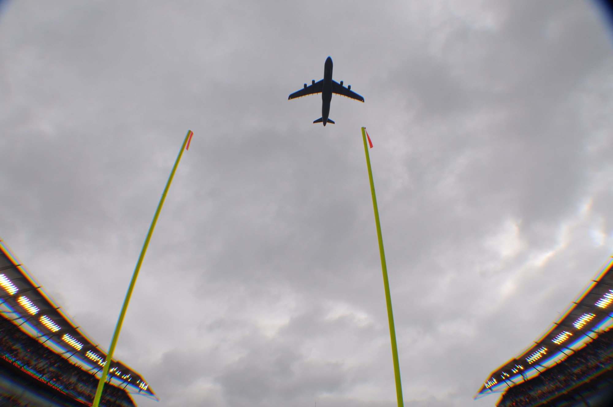 WRIGHT-PATTERSON AIR FORCE BASE, Ohio - The 445th Airlift Wing C-5 Galaxy performs a flyover over Paul Brown Stadium before the Cincinnati Bengals vs. New Orleans Saints football game Dec. 5.  (U.S. Air Force photo/Tech. Sgt. Jeremy Caskey)