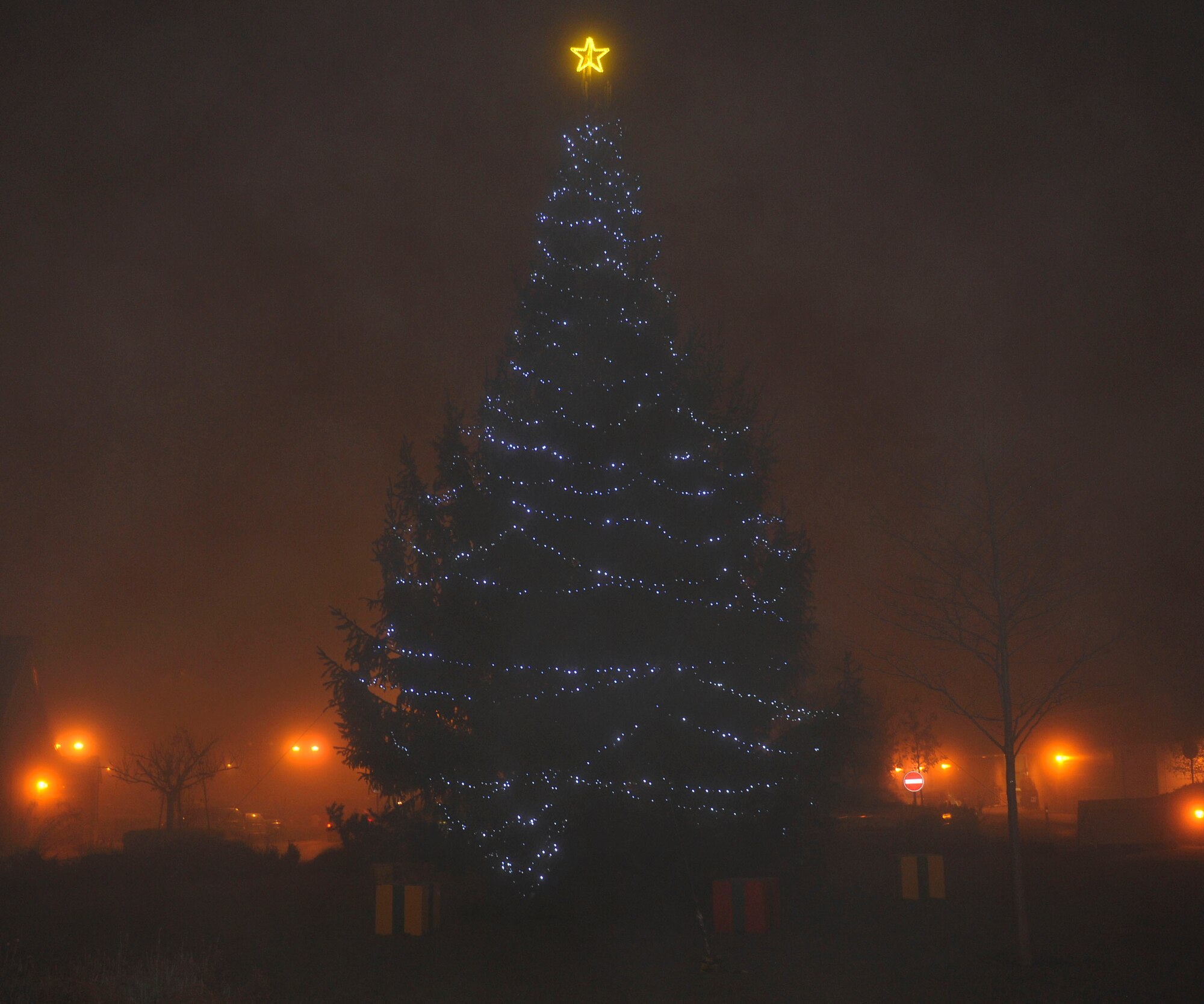 ROYAL AIR FORCE LAKENHEATH, England - The 48th Fighter Wing Christmas tree was lit during a ceremony Dec. 3. The event was presided over by 48th FW Commander Col. John Quintas and celebrated the kickoff of the holiday season for Lakenheath. (U.S. Air Force photo/Staff Sgt. Connor Estes)