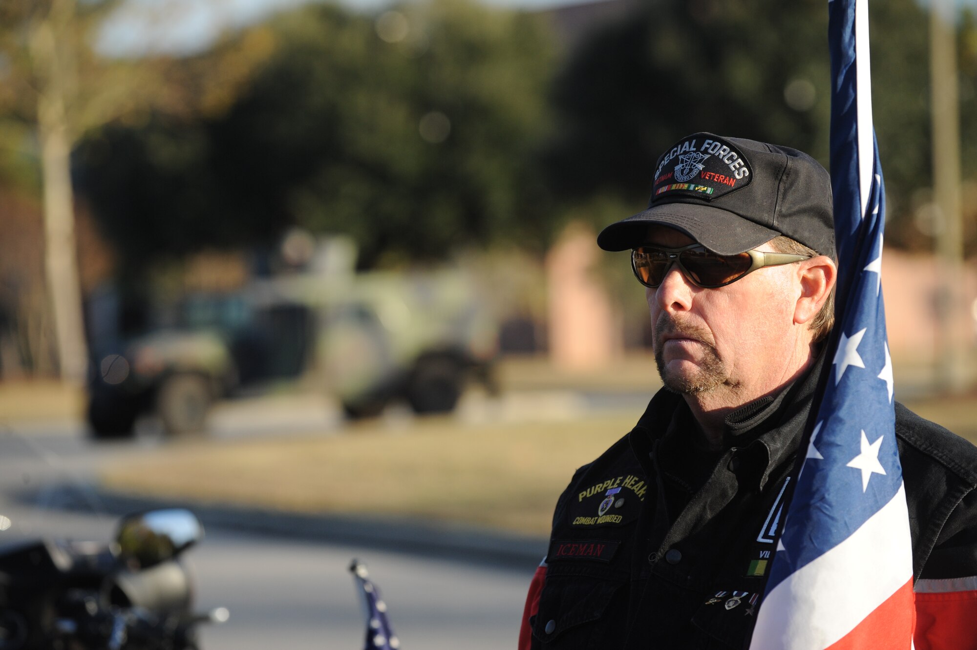 Mike Howey from the Patriot Guard Riders stands at attention during a retreat ceremony at Joint Base Charleston-Air Base, S.C., Dec. 3, 2010. The Patriot Guard Riders is a diverse group of motorcycle riders across the nation who pay respect for those who risk their lives for America's freedom and security. (U.S. Air Force photo/James M. Bowman)