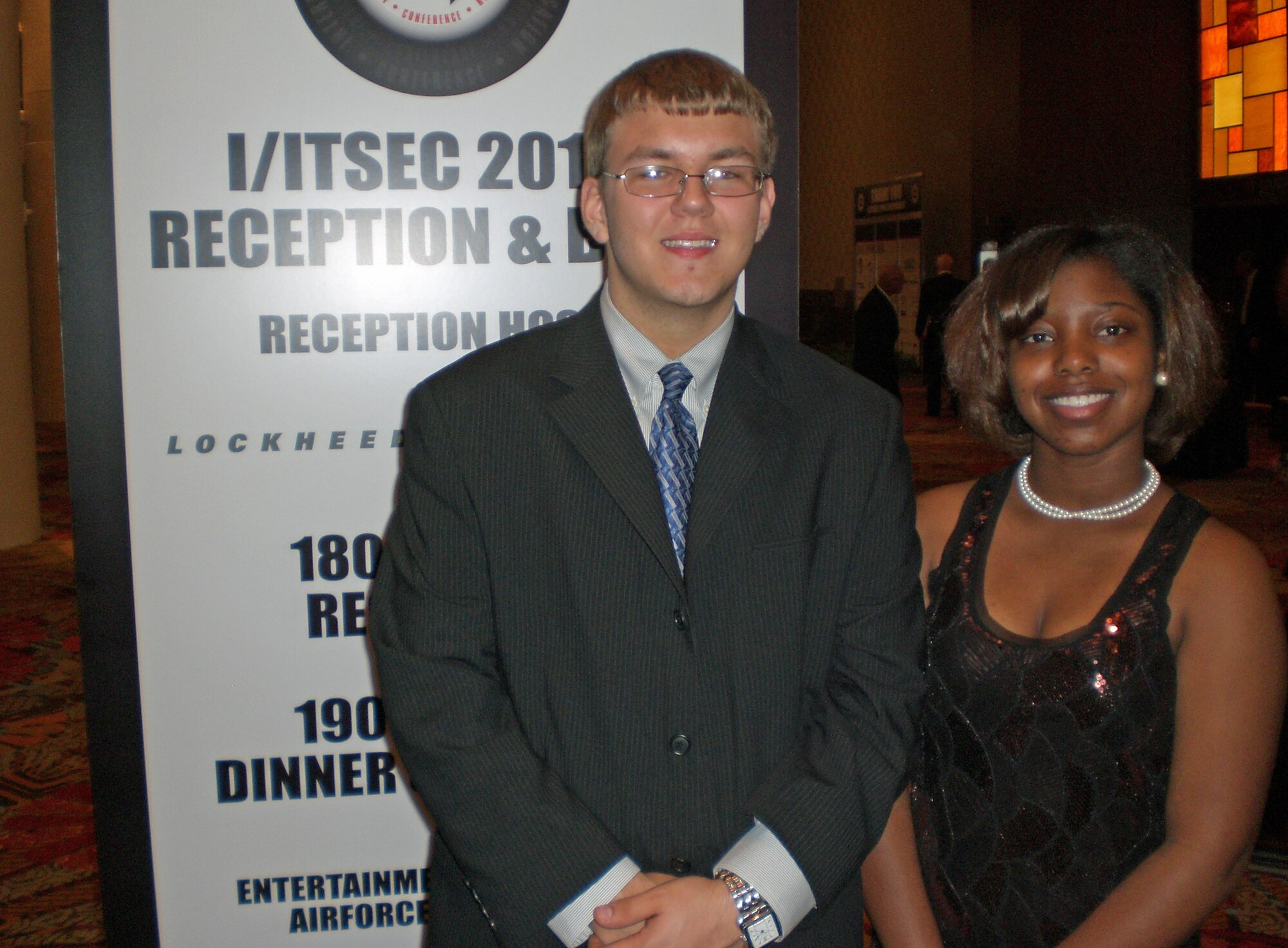 Chris Honious and Jonetta White flew from Dayton, Ohio to Orlando, Fla. to participate in the Interservice/Industry Training, Simulation and Education Conference, Nov. 29 - Dec. 2, 2010. The I/ITSEC conference assembled the top researchers and developers of training and simulation technologies for the largest annual event of its kind in the world. Ms. White and Mr. Honious both attend Dayton Early College Academy, an urban charter school for 7th to 12th grade students in Dayton. They presented information on robotics during a program featuring future leaders. (U.S. Air Force photo/Derek Kaufman)
