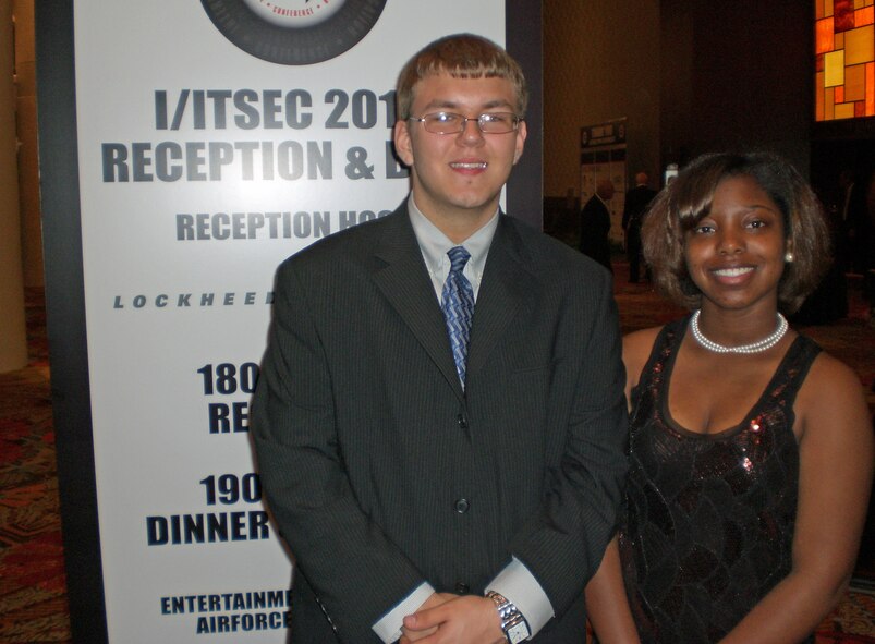 Chris Honious and Jonetta White flew from Dayton, Ohio to Orlando, Fla. to participate in the Interservice/Industry Training, Simulation and Education Conference, Nov. 29 - Dec. 2, 2010. The I/ITSEC conference assembled the top researchers and developers of training and simulation technologies for the largest annual event of its kind in the world. Ms. White and Mr. Honious both attend Dayton Early College Academy, an urban charter school for 7th to 12th grade students in Dayton. They presented information on robotics during a program featuring future leaders. (U.S. Air Force photo/Derek Kaufman)