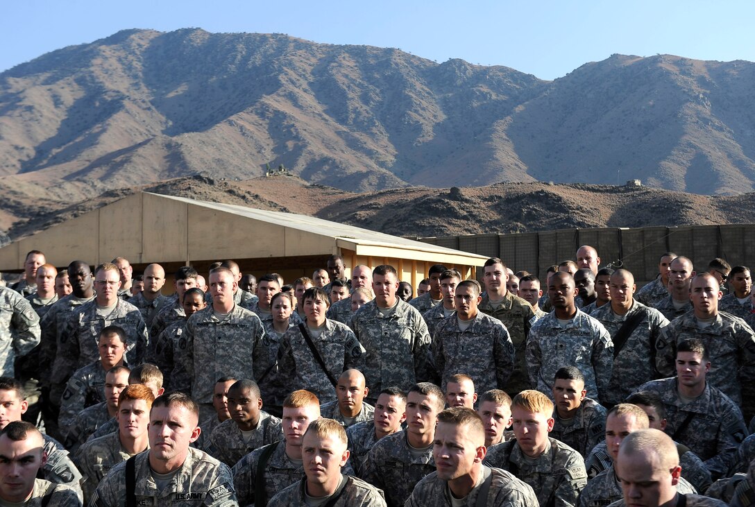 U.S. Army soldiers assigned to the 101st Airborne Division's 327th Infantry Regiment listen to remarks given by U.S. Defense Secretary Robert M. Gates during his visit to Forward Operating Base Joyce, Afghanistan, Dec. 7, 2010. 