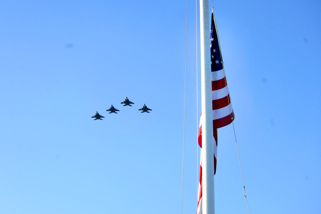 F-16's fly over the flag pole on Atterbury Circle, Joint Base Pearl ...