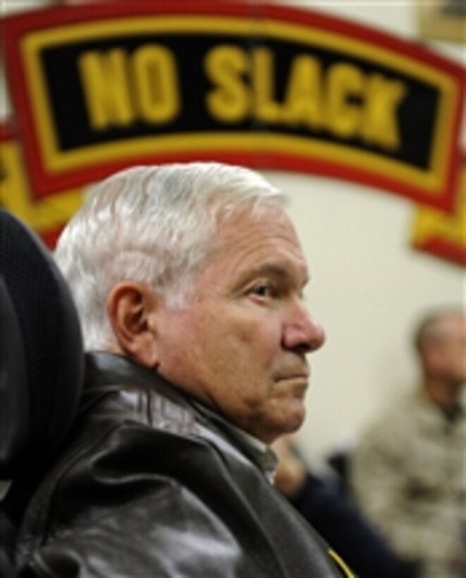 Secretary of Defense Robert M. Gates listens to an operations brief from the 327th Regiment of the 101st Airborne Division deployed to Forward Operating Base Joyce, Afghanistan, on Dec. 7, 2010.  Gates is in Afghanistan receiving operational updates and thanking the troops for their service.  