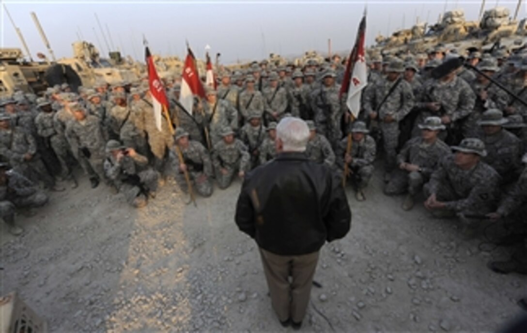 Soldiers of 1st Squadron 61st Cavalry 101st Airborne Division listen to Secretary of Defense Robert M. Gates while he visits Forward Operating Base Connolly, Afghanistan, on Dec. 7, 2010.  Gates is in Afghanistan receiving operational updates and thanking the troops for their service.  