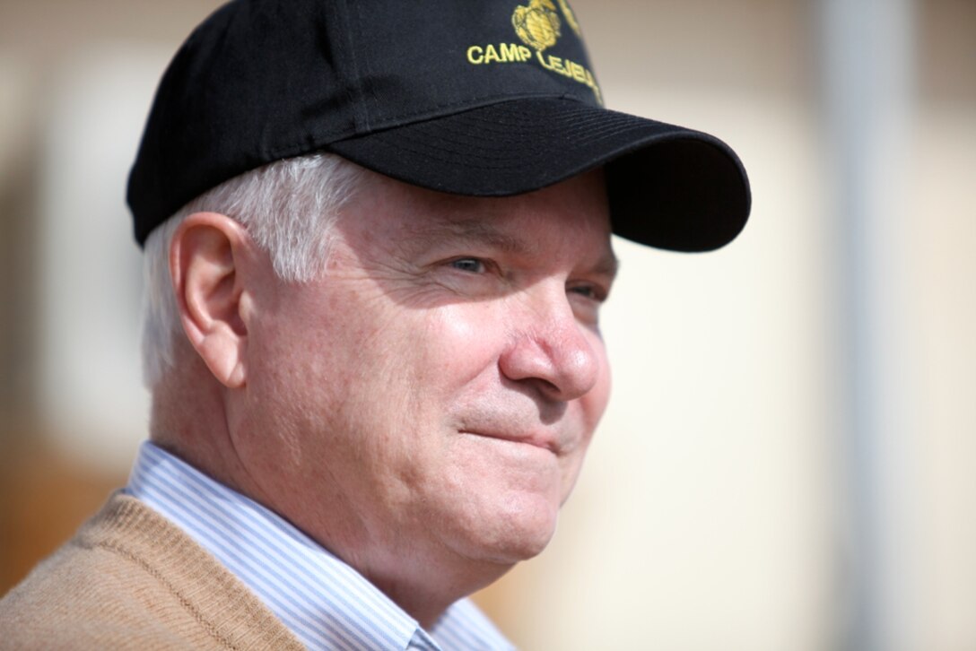 Secretary of Defense Robert Gates addresses more than 200 service members with 1st Marine Logistics Group (Forward) at Camp Leatherneck, Afghanistan, Dec. 8. During Gates’ visit, he applauded the troops for their accomplishments and dedication. He shook hands with each service member, thanking them for their service.