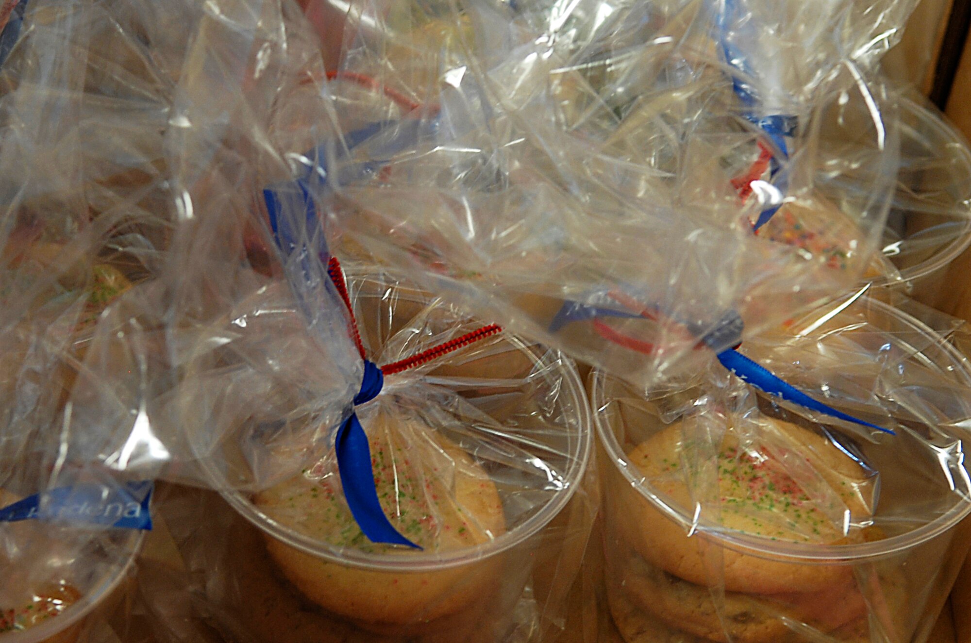 Bagged and ribboned cookies are ready to be delivered to Kadena dorm residents from all branches, Dec. 3. More than 12,000 cookies were baked for the estimated 2,500 servicemembers living in the dorms. (U.S. Air Force photo/ Airman 1st Class Tara A. Williamson)