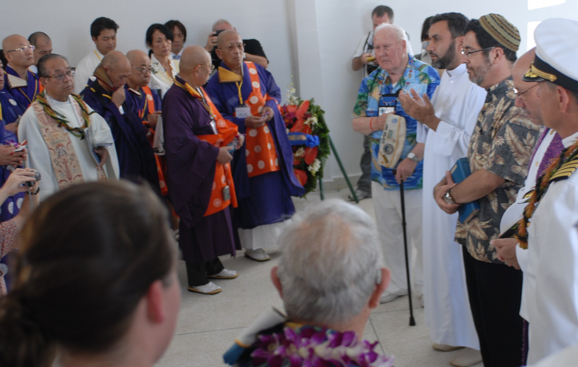 International religious leaders of all faiths gather to offer prayers and blessings on board the USS Arizona Memorial Dec. 7, 2010. (U.S. Air Force photo by Staff Sgt. Carolyn Viss)