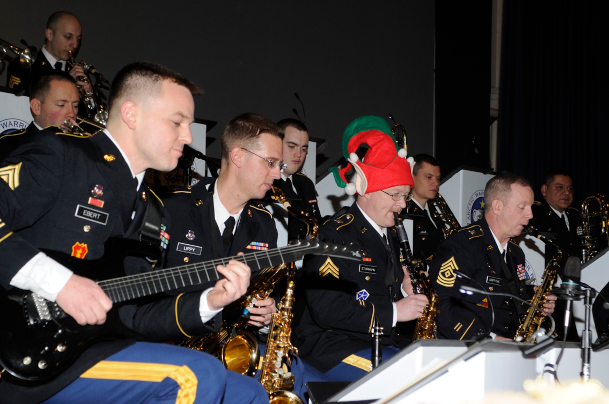 Members of the 9th Army Band provide a concert of holiday music at the Richardson Theatre before the tree lighting ceremony, Dec. 2. (U.S. Air Force photo/Steven White)