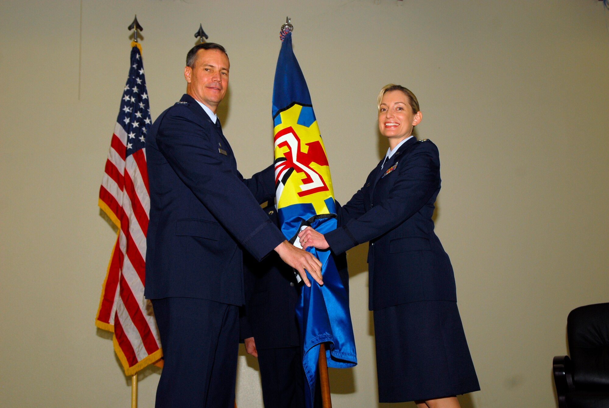 Col Anne B. Gunter assumes command of the 944th Fighter Wing's Mission Support Group from Col Michael G. Popovich during a ceremony Dec. 4 at Luke Air Force Base, Ariz.