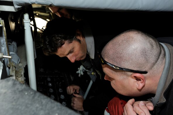 Left to right) Chris Stocks and Scott McIntyre, Orlando, Fla. firefighters and paramedics, explore the boom pod of a KC-135 Stratotanker, Dec. 3, 2010, at McConnell Air Force Base, Kan. The firefighters gave a “Street Smart” presentation to McConnell Airmen detailing the consequences of impaired driving. (U.S. Air Force Photo/Airman 1st Class Armando A. Schwier-Morales) 