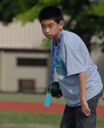 Justin Ikehara, 12, plays bocce ball during Special Olympics at Joint Base Pearl Harbor-Hickam, Hawaii, Dec. 4, 2010. (U.S. Air Force photo/Staff Sgt. Carolyn Viss)