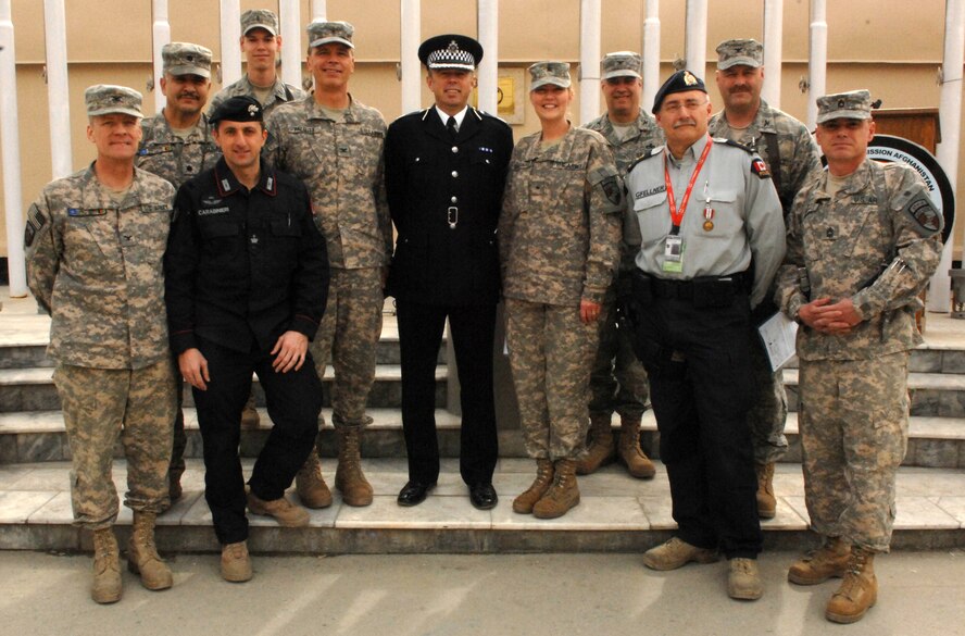 Vice Chief of Staff, Col. Paul Cummings (4th from right) poses with the NATO Training Mission Afghanistan Police Advisory Group made up of US Army, US Air Force, Royal Canadian Mounted Police, Italian Carabineri, and London Police personnel.(Submitted-National Guard Photo)