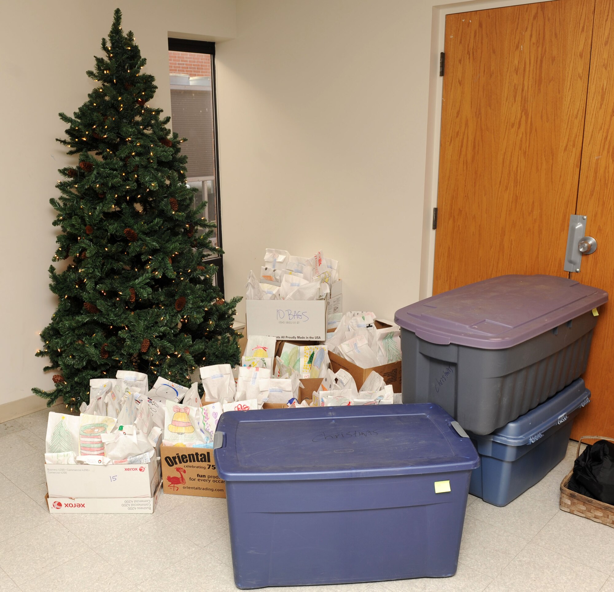 SCOTT AIR FORCE BASE, Ill. – 290 bags of cookies are prepared to be delivered to the dorm residents Dec. 7, 2010.  With the help of base volunteers and the local community, the Officer Spouses Club collected over 12,000 cookies to be hand delivered to Airmen in the dorms and around the base. (U.S. Air Force photo/ Airman 1st Class Divine Cox) 