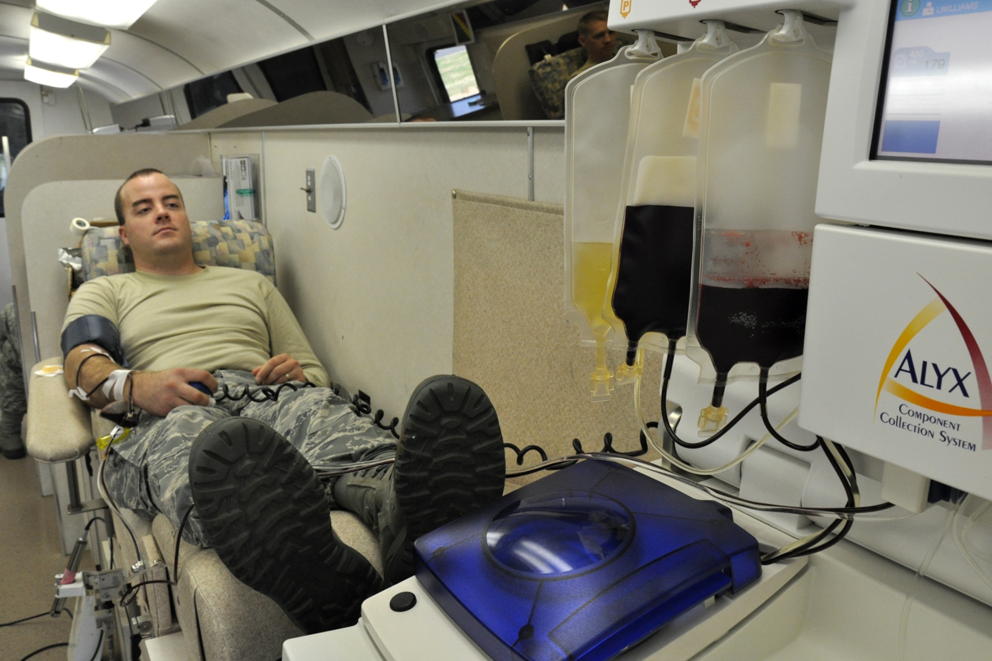 Tech. Sgt. David Walker, vehicle maintenance mechanic, 917th Logistics Readiness Squadron, has blood drawn in the LifeShare Blood Centers’ donor bus during the 917th Wing Blood Drive in the course of the Unit Training Assembly weekend at Barksdale Air Force Base, La., Dec. 4, 2010. The mission of LifeShare Blood Centers is to provide quality blood, blood components and related services for use by patients on an efficient cost effective basis. The 917th Wing takes pride in supporting the community in which they serve by donating blood. Together, we save lives! For information about donating blood to assist your community or family, contact: www.lifesharedonorclub.org or www.lifeshare.org. (U.S. Air Force photo /Tech. Sgt. Jeff Walston)