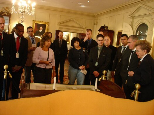 Joint Base McGuire-Dix-Lakehurst, N.J., company grade officers view a copy of the Treaty of Paris in the Department of State’s Diplomatic Reception Room in Washington, D.C., on Dec. 2, 2010. The treaty formally ended the American Revolutionary War in 1783. (U.S. Air Force Photo/Capt. Dave Gaulin)