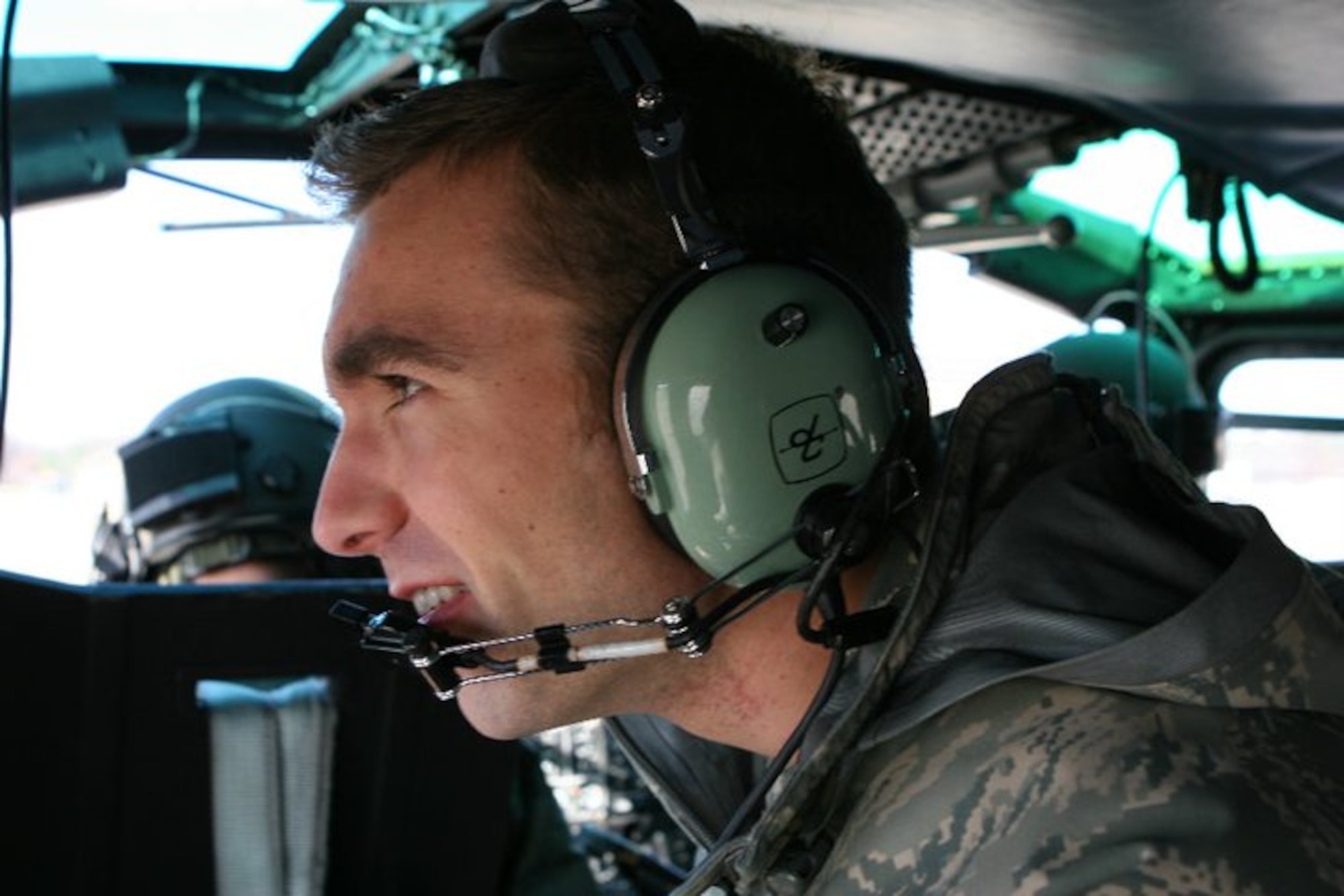 WASHINGTON -- 1st Lt. Ryan Coughlan, 819th Global Support Squadron, looks out over Washington during a familiarization flight with the 1st Helicopter Squadron. Twenty-three company grade officers from Joint Base McGuire-Dix-Lakehurst visited the capitol to expose themselves to civilian government and policy institutions that interact with the Air Force and Department of Defense. (U.S. Air force photo/1st Lt. James Gallagher)