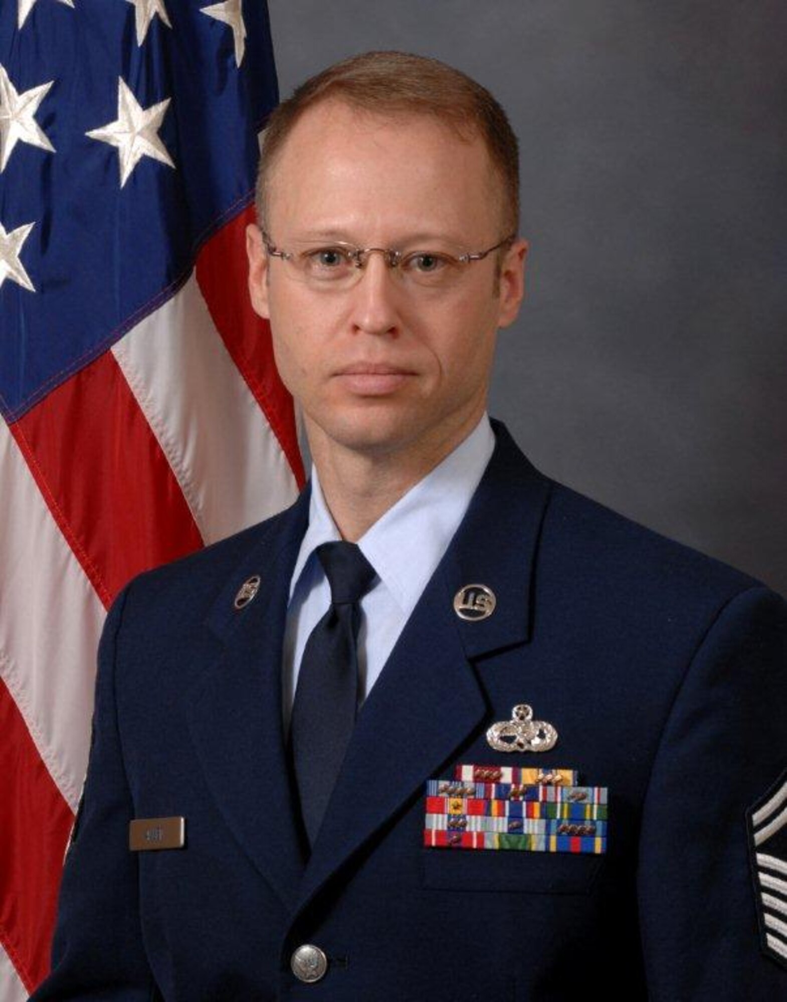 Senior Master Sgt. Curtis W. Allen is being promoted to chief master sergeant, the highest enlisted rank in the Air Force. (Photo by David Housch)