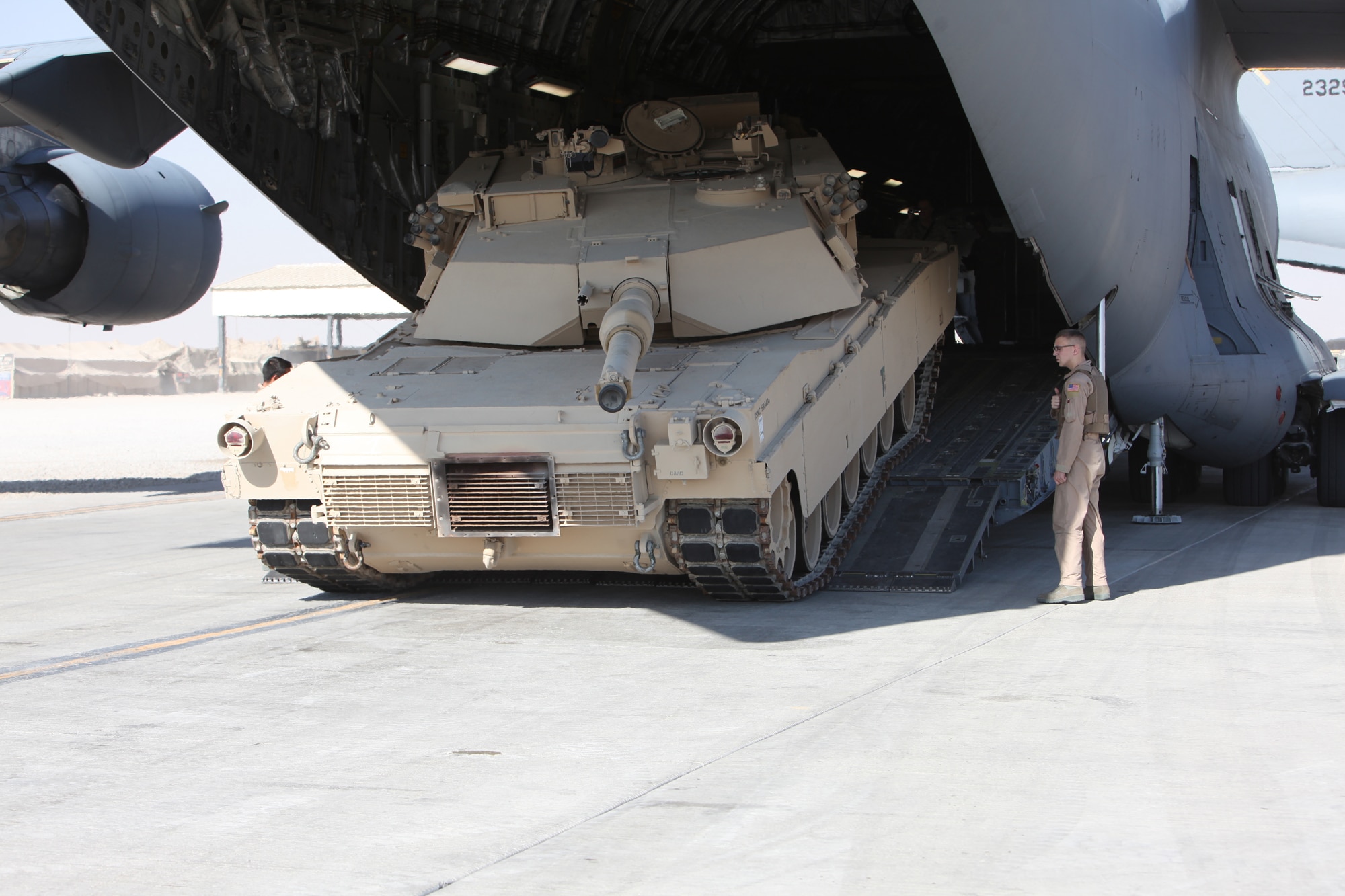 A U.S. Marine Corps M1A2 Abrams main battle tank is offloaded aboard Camp Bastion, Afghanistan Nov. 25, 2010.  The Marine tank was flown in country on-board a U.S Air Force Boeing C-17 Globemaster III and marks the first to arrive. ( U.S. Marine Corps photo by LCpl McKenzie James / Released)