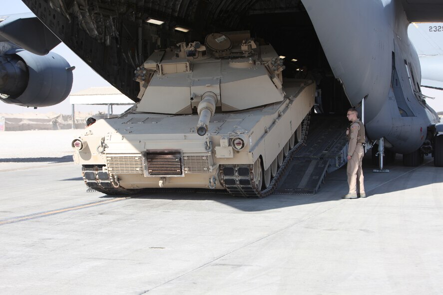 A U.S. Marine Corps M1A2 Abrams main battle tank is offloaded aboard Camp Bastion, Afghanistan, on Nov. 25, 2010. The Marine tank was flown in country on-board a U.S Air Force Boeing C-17 Globemaster III and marks the first to arrive. ( U.S. Marine Corps Photo/Lance Cpl. McKenzie James) 