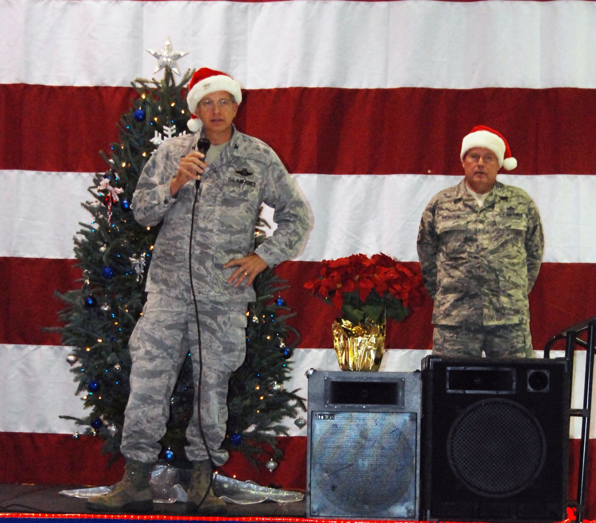 Citizen Airmen of the 94th Airlift Wing gathered at the Human Resources Development Council sponsored Holiday Party at Hangar 5 here Dec. 4. Col. Timothy E. Tarchick spoke about the importance of the season. (U.S. Air Force photo/ Senior Airman Danielle Campbell)