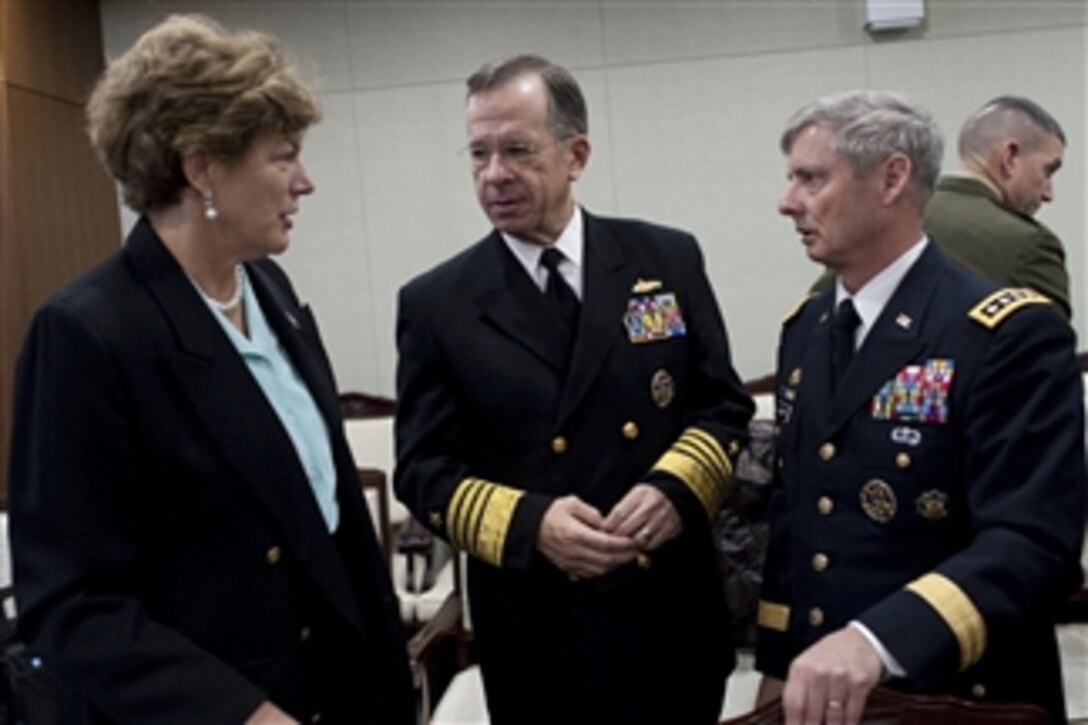 Chairman of the Joint Chiefs of Staff Adm. Mike Mullen, U.S. Navy, speaks with U.S. Ambassador to South Korea Kathleen Stephens and Commanding General of U.S. Forces Korea U.S. Army Gen. Walter "Skip" Sharp during meetings in Seoul, Republic of South Korea, on Dec. 8, 2010.  Mullen traveled to Korea to meet with defense officials there reassuring the strength of the U.S.-South Korean alliance in light of recent tensions with the north.  