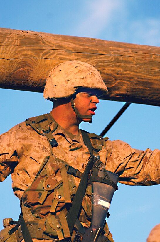 Recruit Lawrence Routt, Platoon 1047, Company C, cautiously navigates a rope bridge during the final day of the Crucible at Weapons and Field Training Battalion, Marine Corps Base Camp Pendleton, Calif., Dec. 8.  The Crucible is the final 54-hour exercise recruits must accomplish to become Marines.