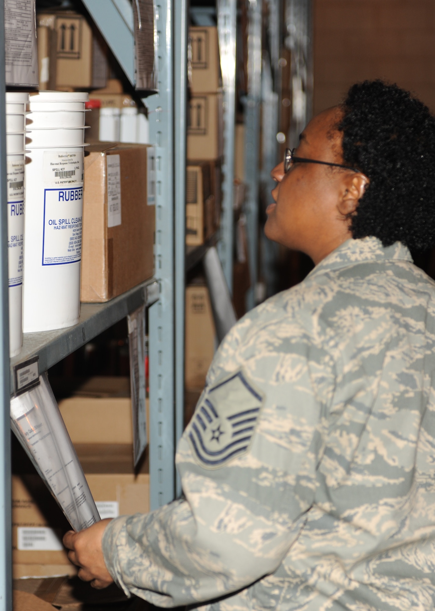 KUNSAN AIR BASE, Republic of Korea -- Master Sgt. Bernita Allen, Logistics Compliance Assessment Program supply evaluator, inspects shelf items at the Wolf Pack’s hazmart here Dec. 8, 2010. During the inspection LCAP members checked for servicability, expiration dates, lot numbers and accountability of items found in the 8th Logistics Readiness Squadron’s warehouse. (U.S. Air Force photo/Senior Airman Ciara Wymbs) 